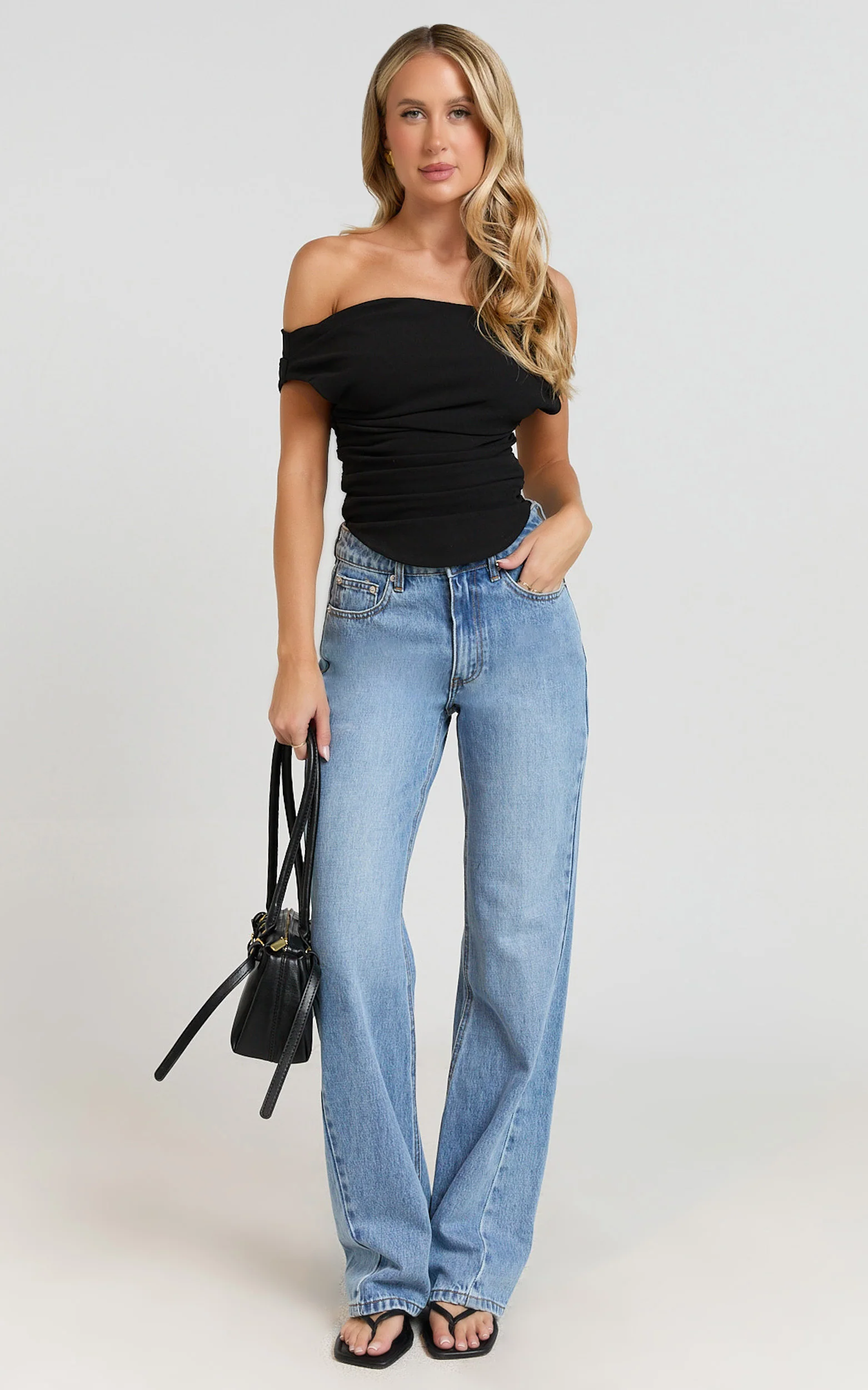 Cleo Top - Off Shoulder Curved Hem Top in Black