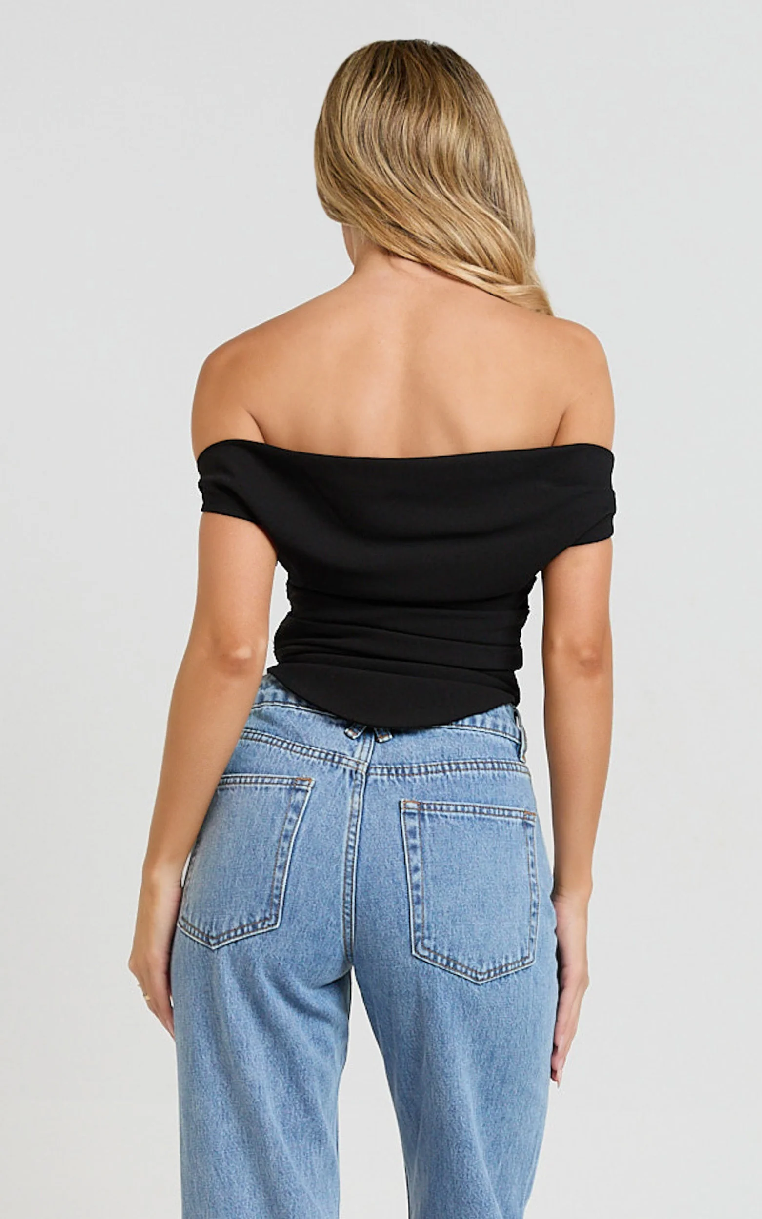 Cleo Top - Off Shoulder Curved Hem Top in Black