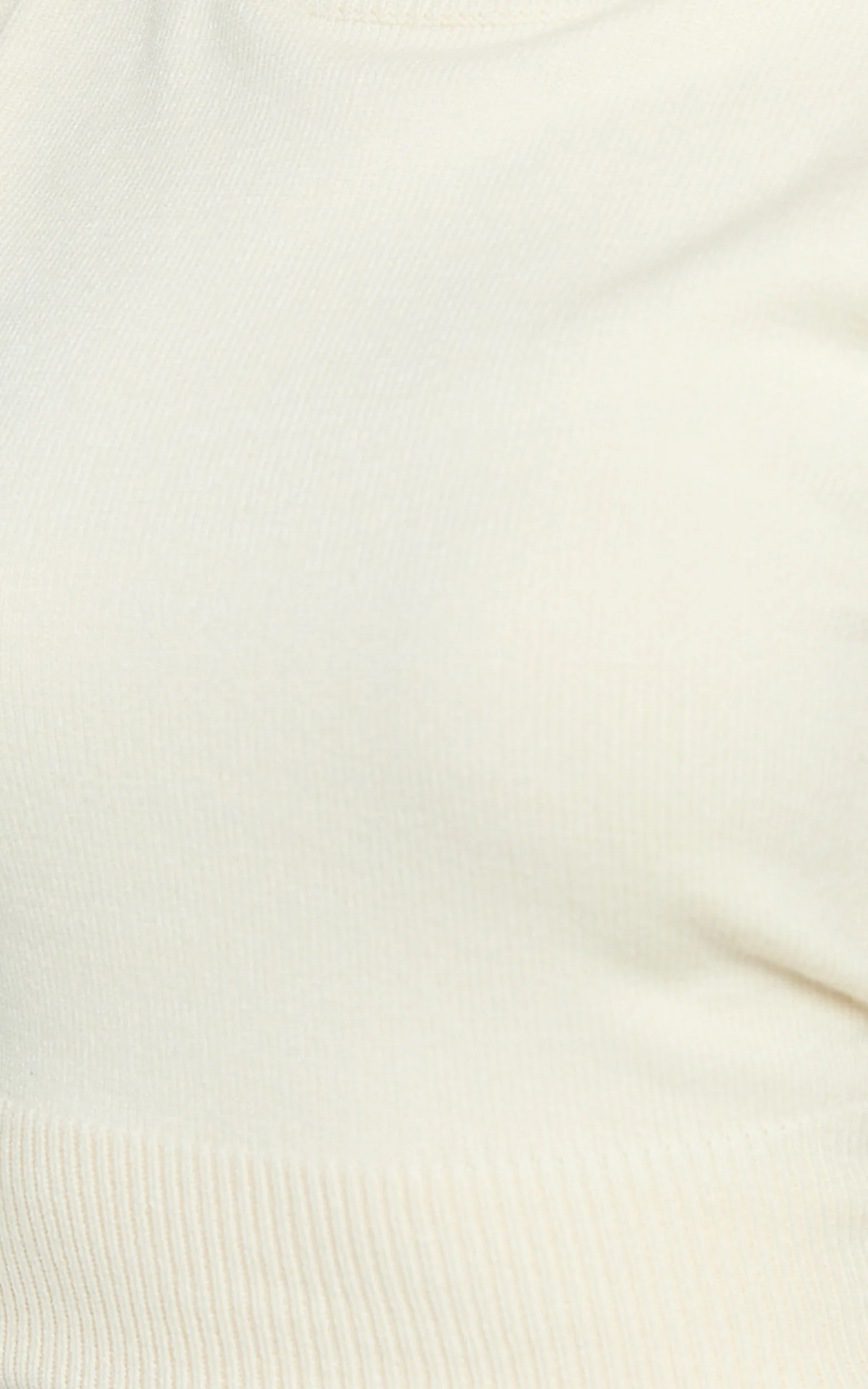 Aveline Top - Sleeveless Roll Neck Knitted Top in Cream