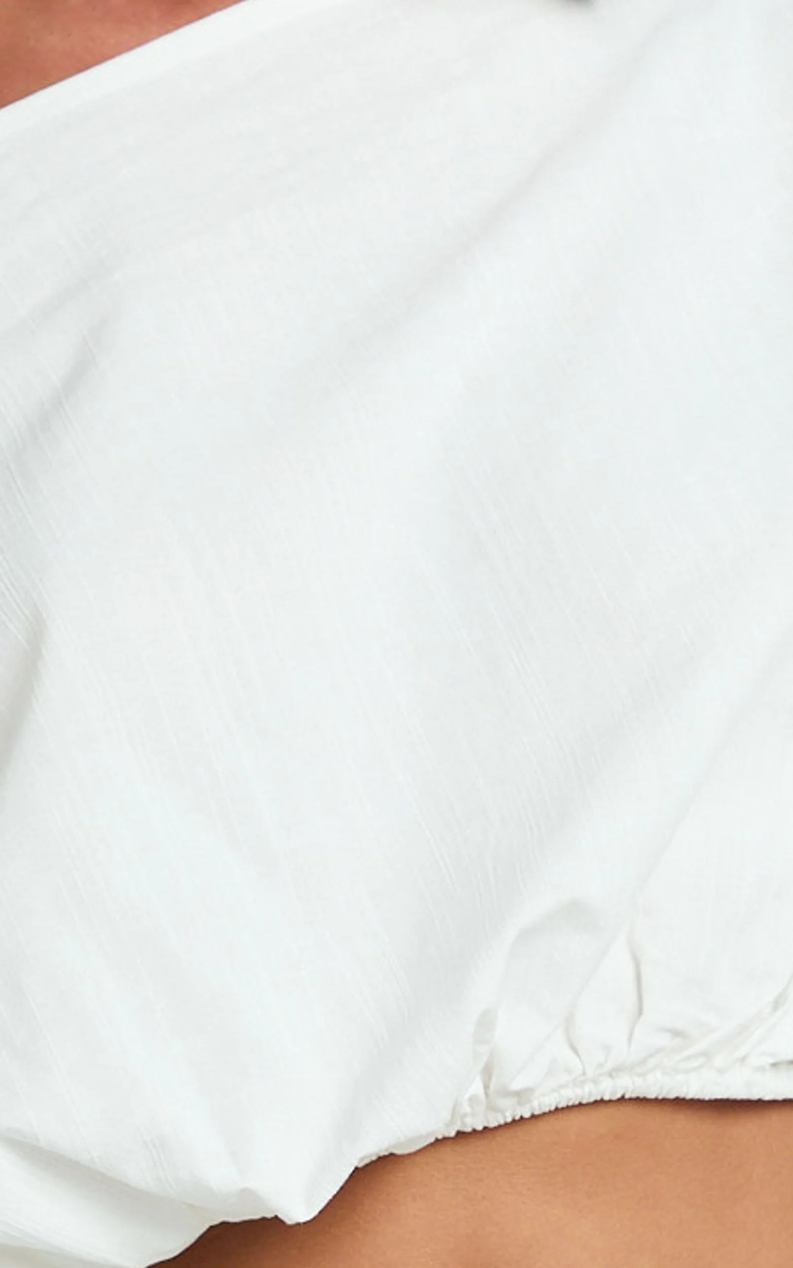 Alesia Top - Asymmetrical Boat Neck Elastic Hem Crop Top in White