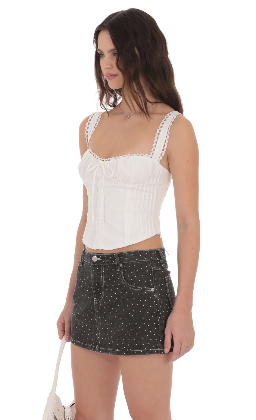 Low Rise Polka Dot Denim Mini Skirt in Faded Black