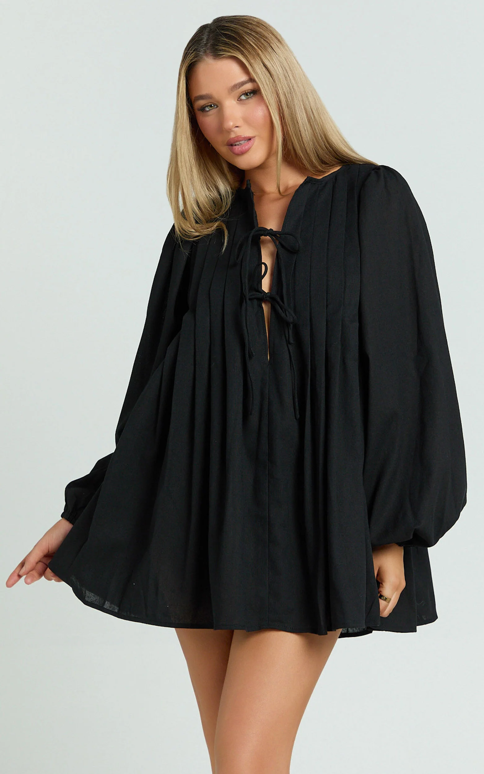 Suzette Mini Dress - High Neck Tie Front Long Sleeve Pleat Front Babydoll Dress in Black