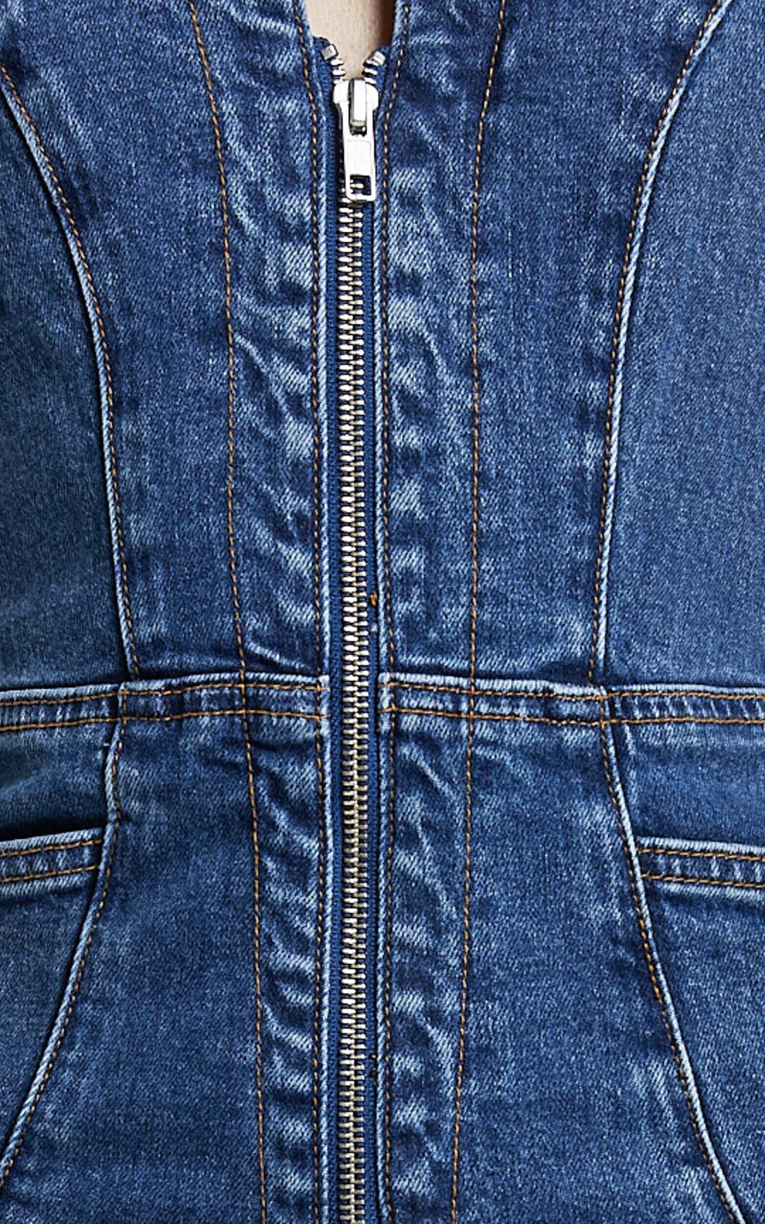 Casidy Jumpsuit - Zip Front Collared Halter Neck Denim in Mid Blue Wash