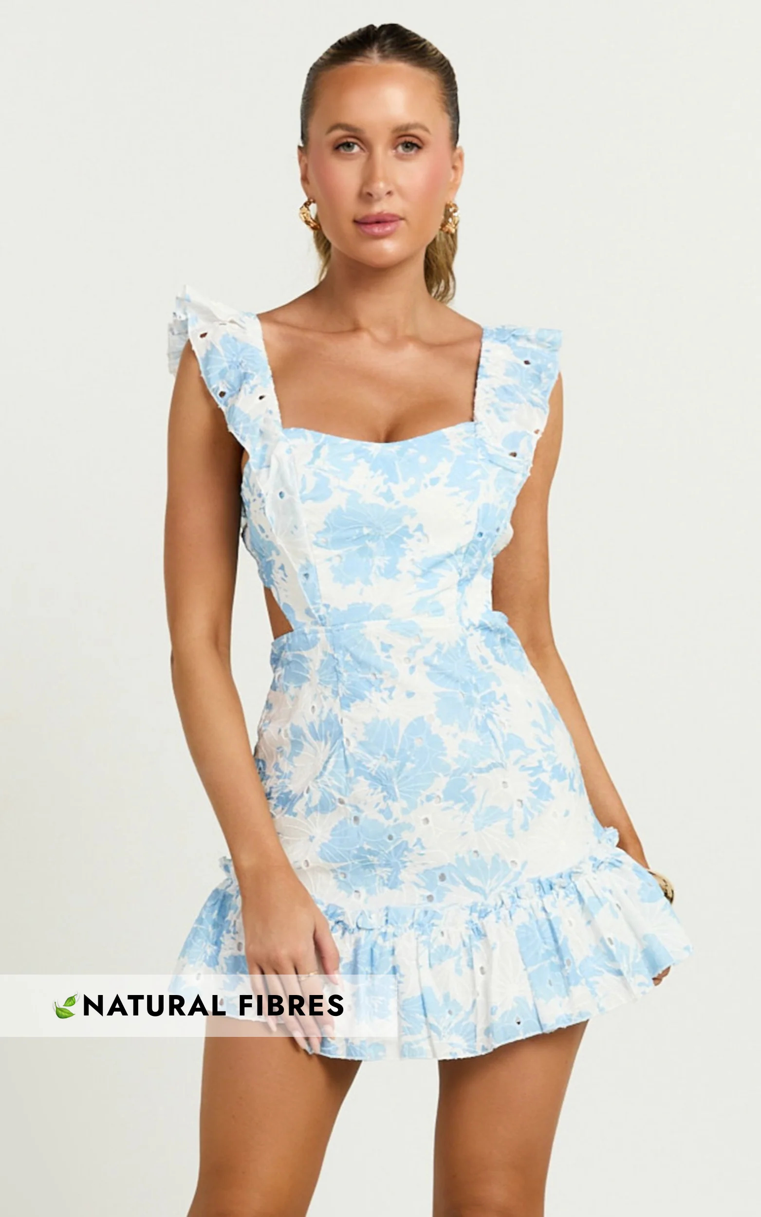 Anisha Mini Dress - Flutter Sleeve Straight Neck With Tie Back Dress in Blue Floral Print