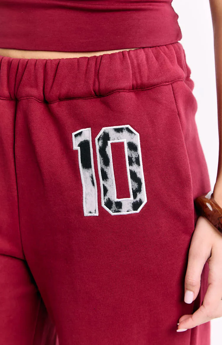 Dania Burgundy Leopard Star Track Pants