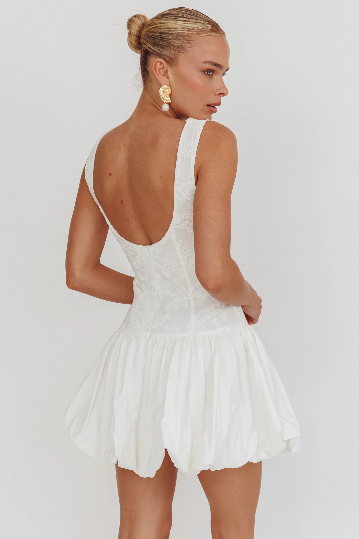 Opulent Sleeveless Bubble Hem Mini Dress Embroidered White