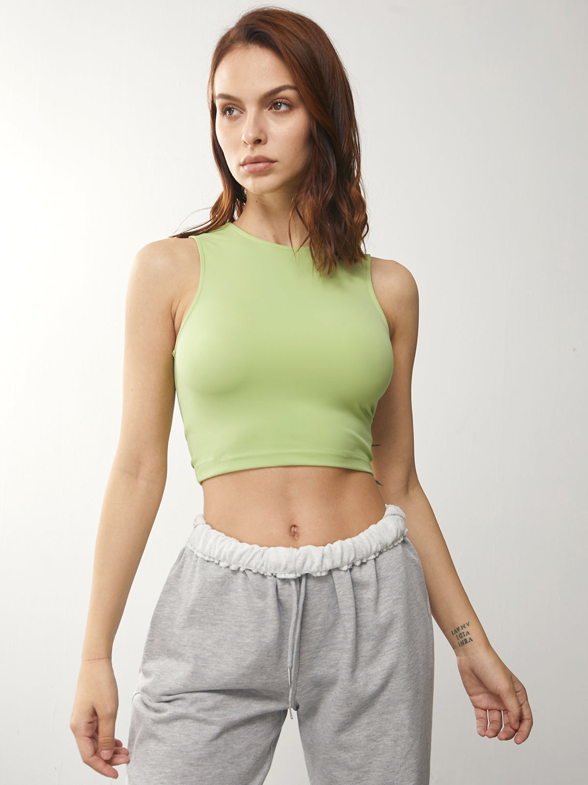 Thecomense - Solid Colored Cropped High Neck Tank Top
