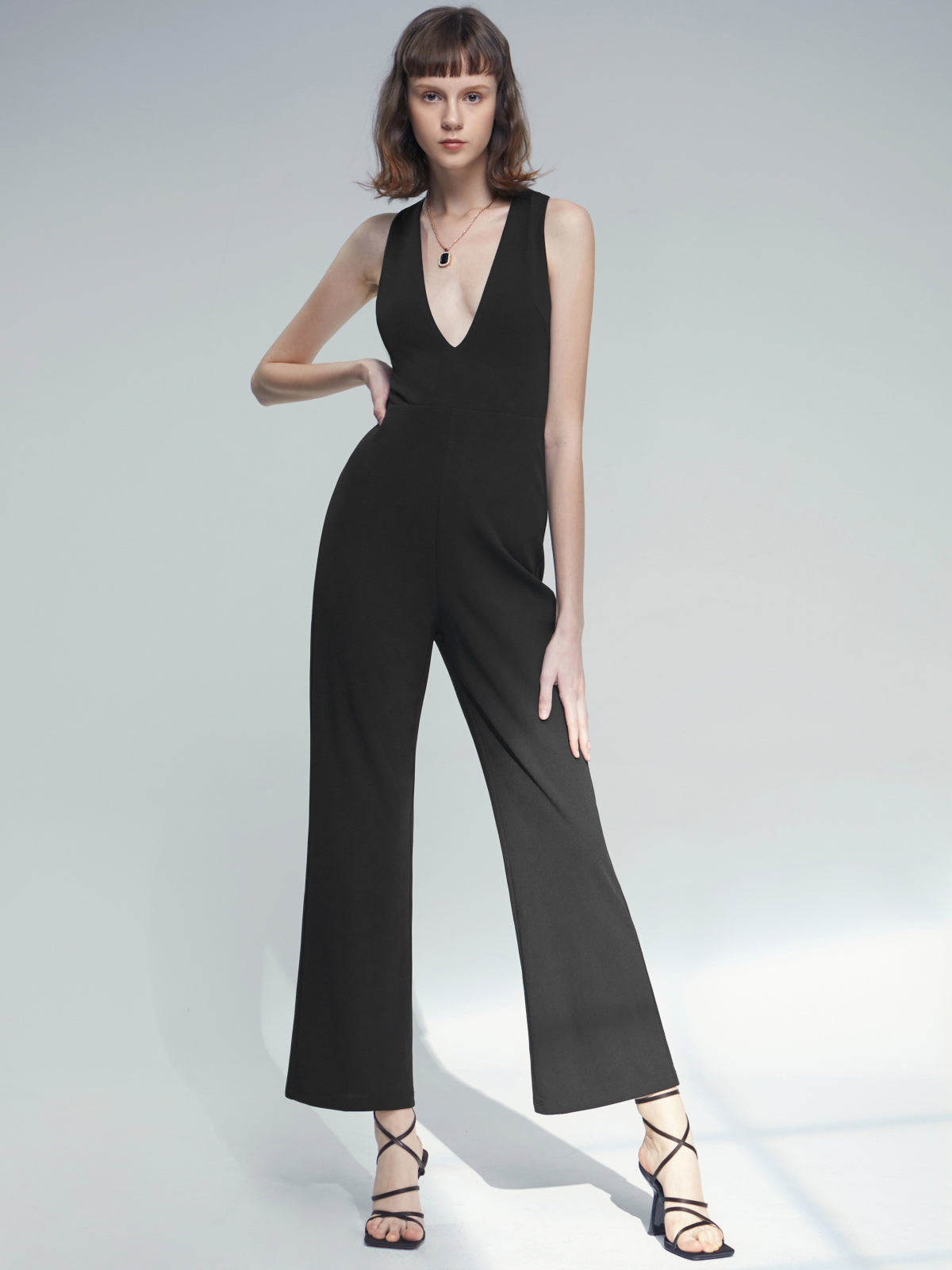 Thecomense - Plunging Sleeveless Classic Leg Jumpsuit