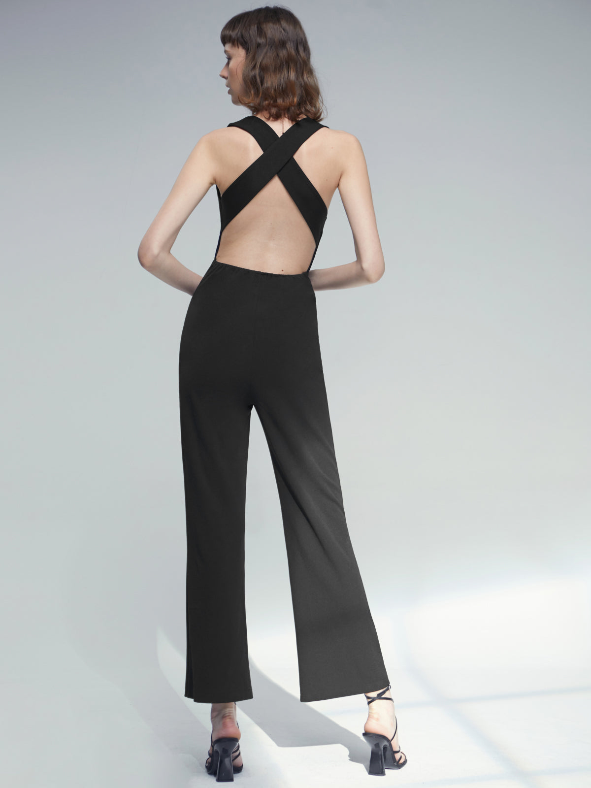 Thecomense - Plunging Sleeveless Classic Leg Jumpsuit