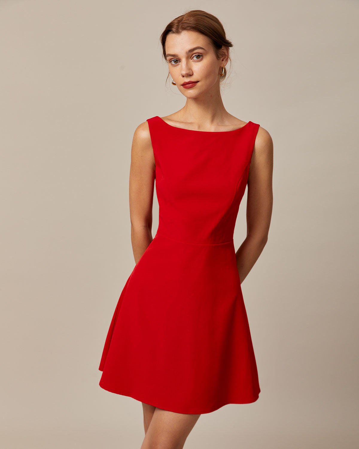 Elegance Redefined: The Sleeveless High Waisted Mini Dress