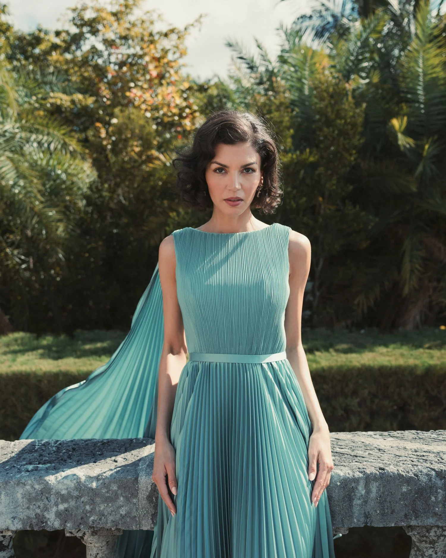 Green Sleeveless High Neck Cape Back Heat Pleated Gown