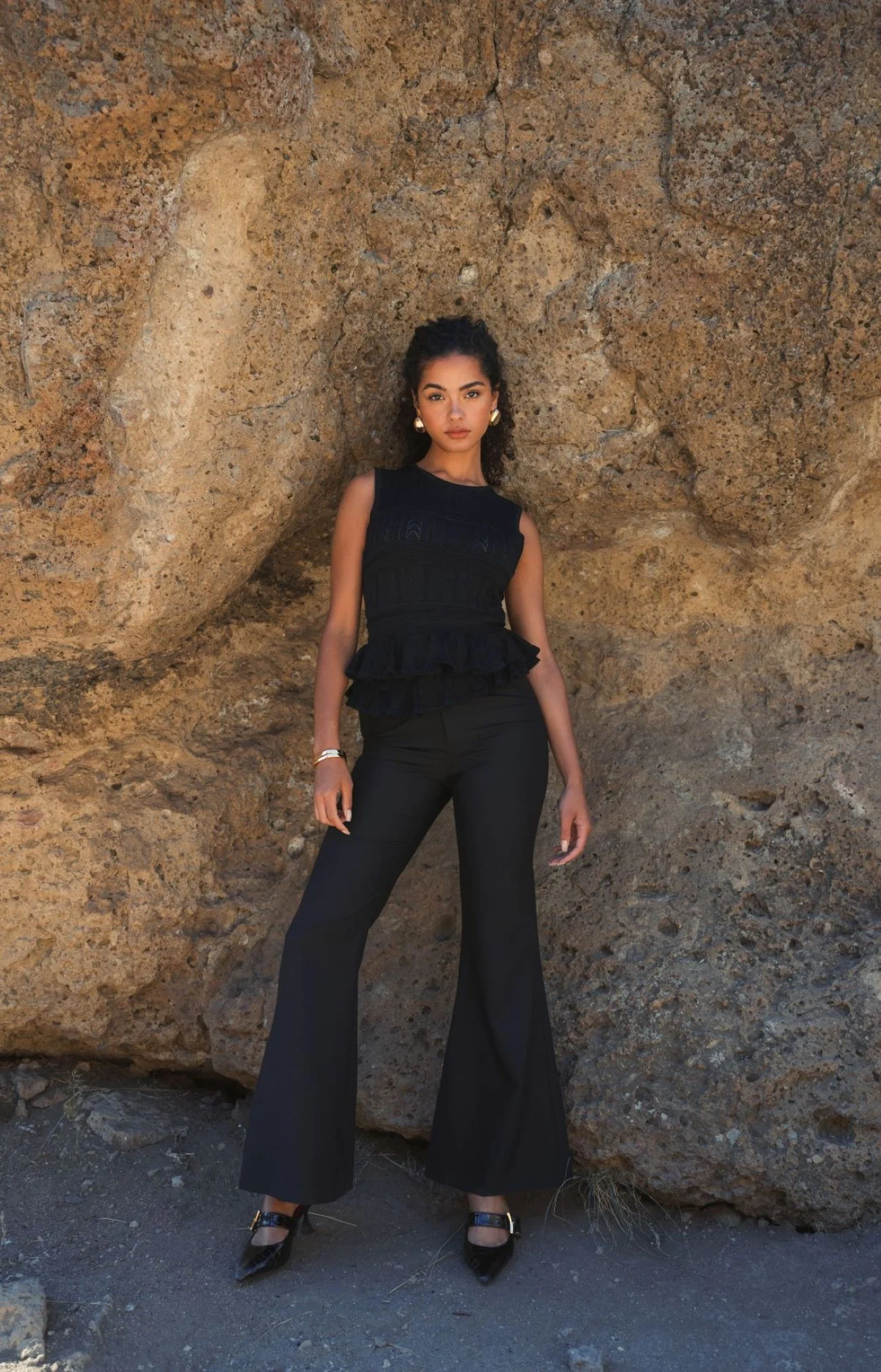 Sleeveless High Neck Knit Top With Ruffle Hem - FINAL SALE