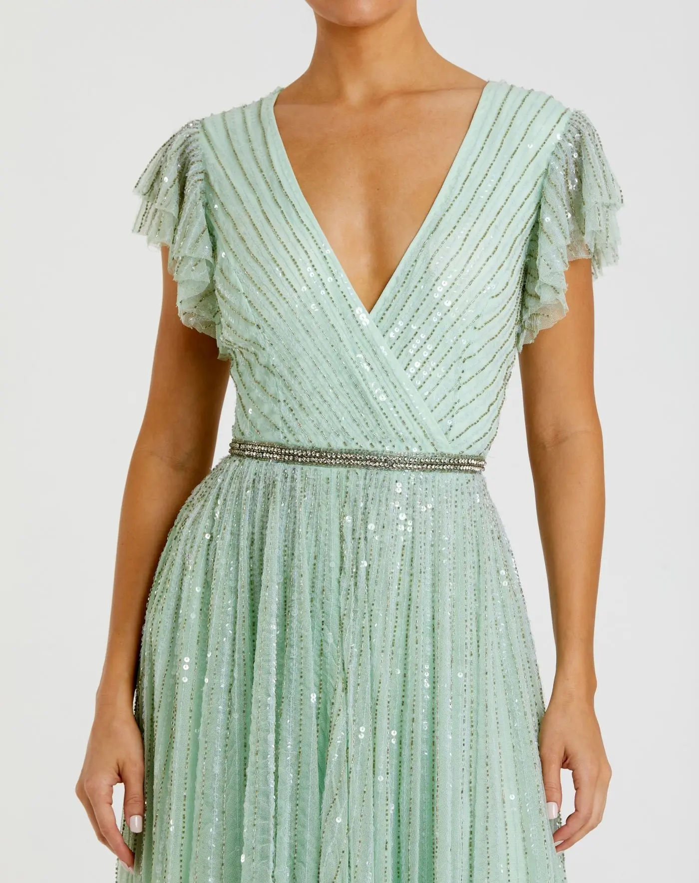 Green Sequined Wrap Over Ruffled Cap Sleeve Gown