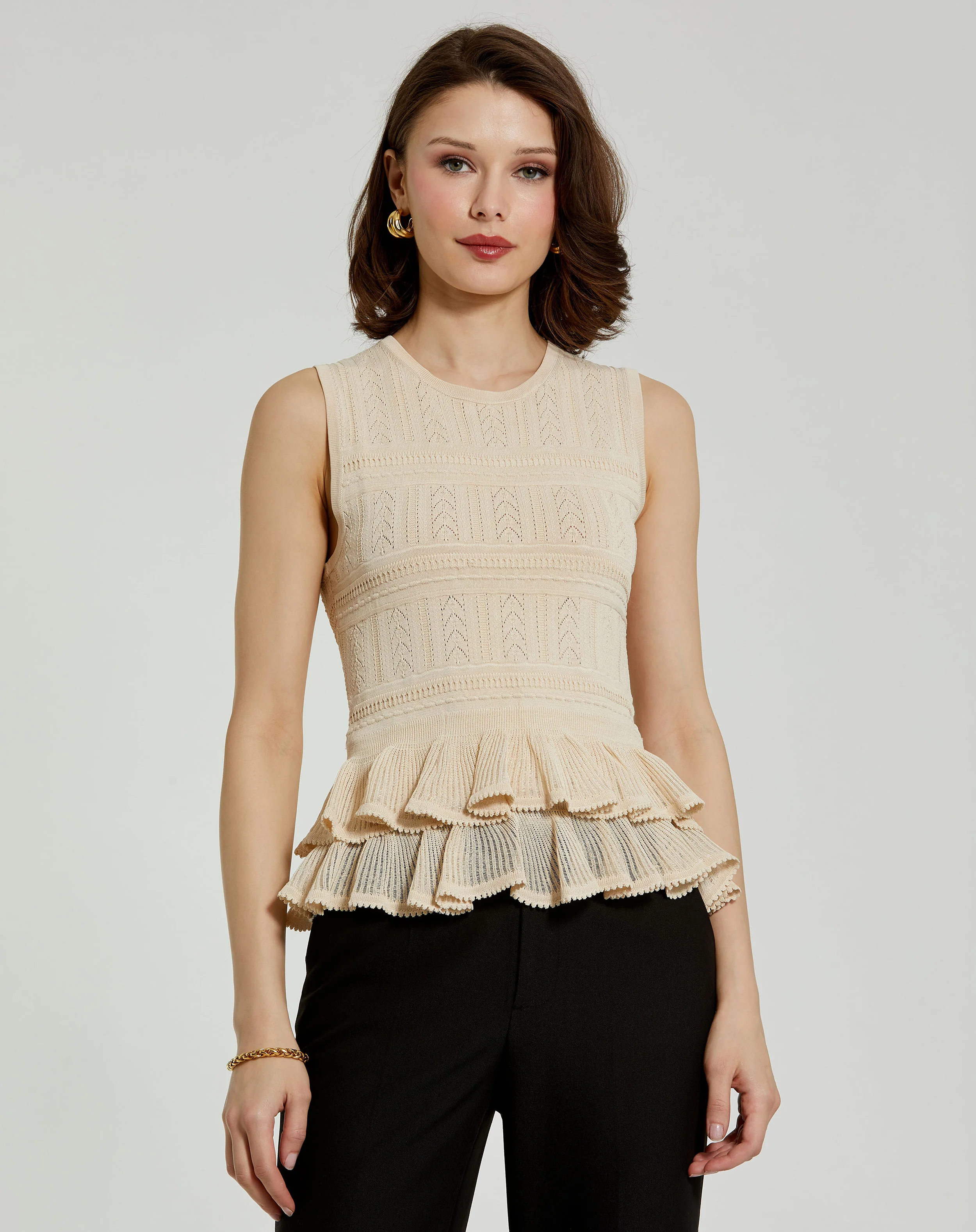 Sleeveless High Neck Knit Top With Ruffle Hem - FINAL SALE