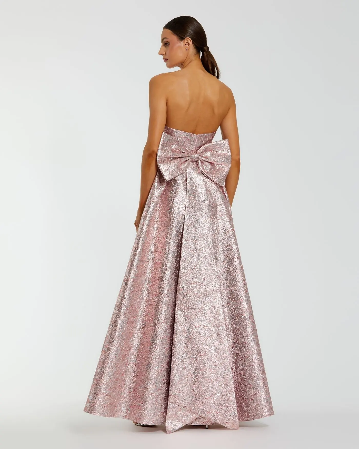 Pink Metallic Strapless Brocade Gown With Oversized Bow