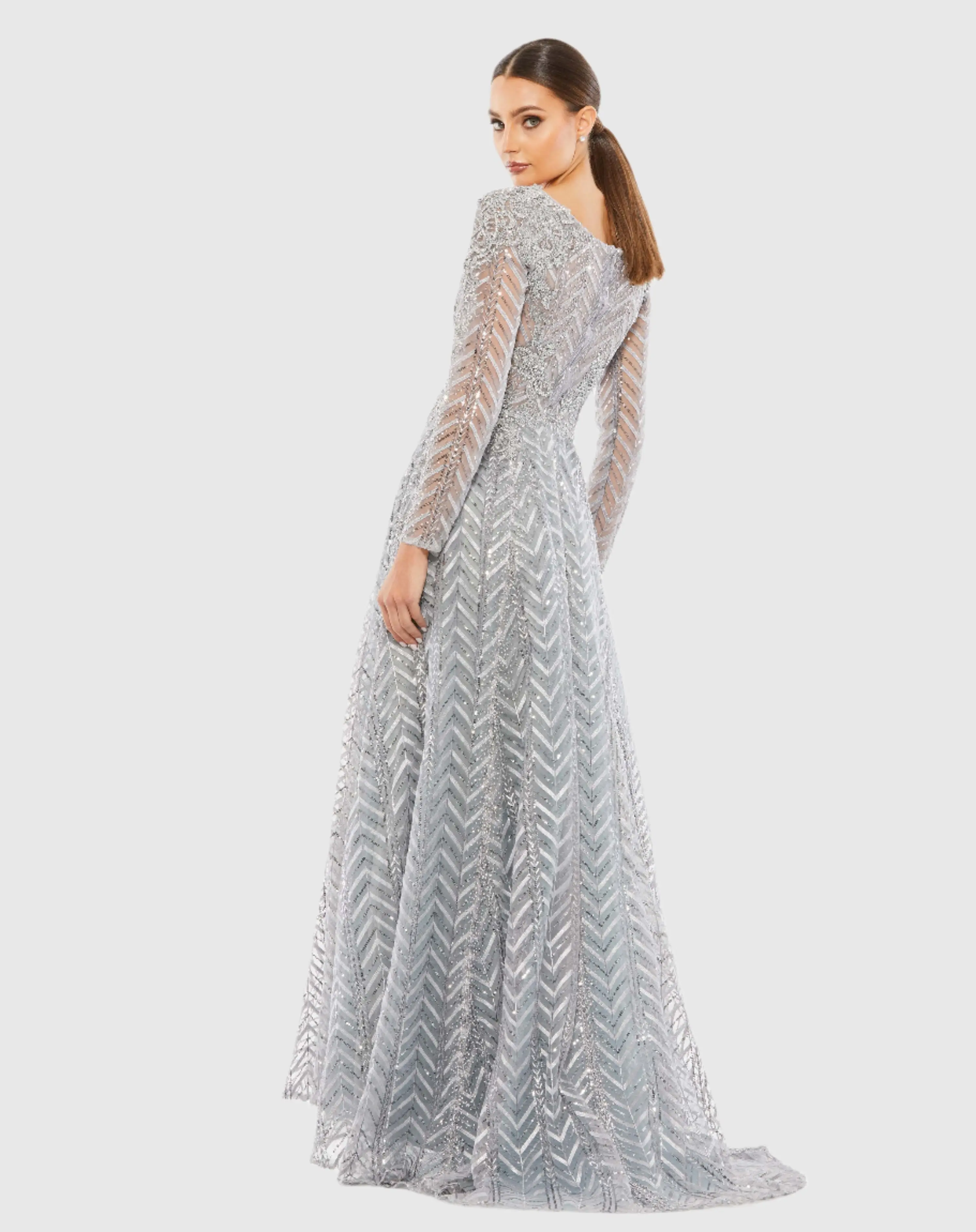 Silver Embellished Illusion Long Sleeve Wrap Over A Line Gown