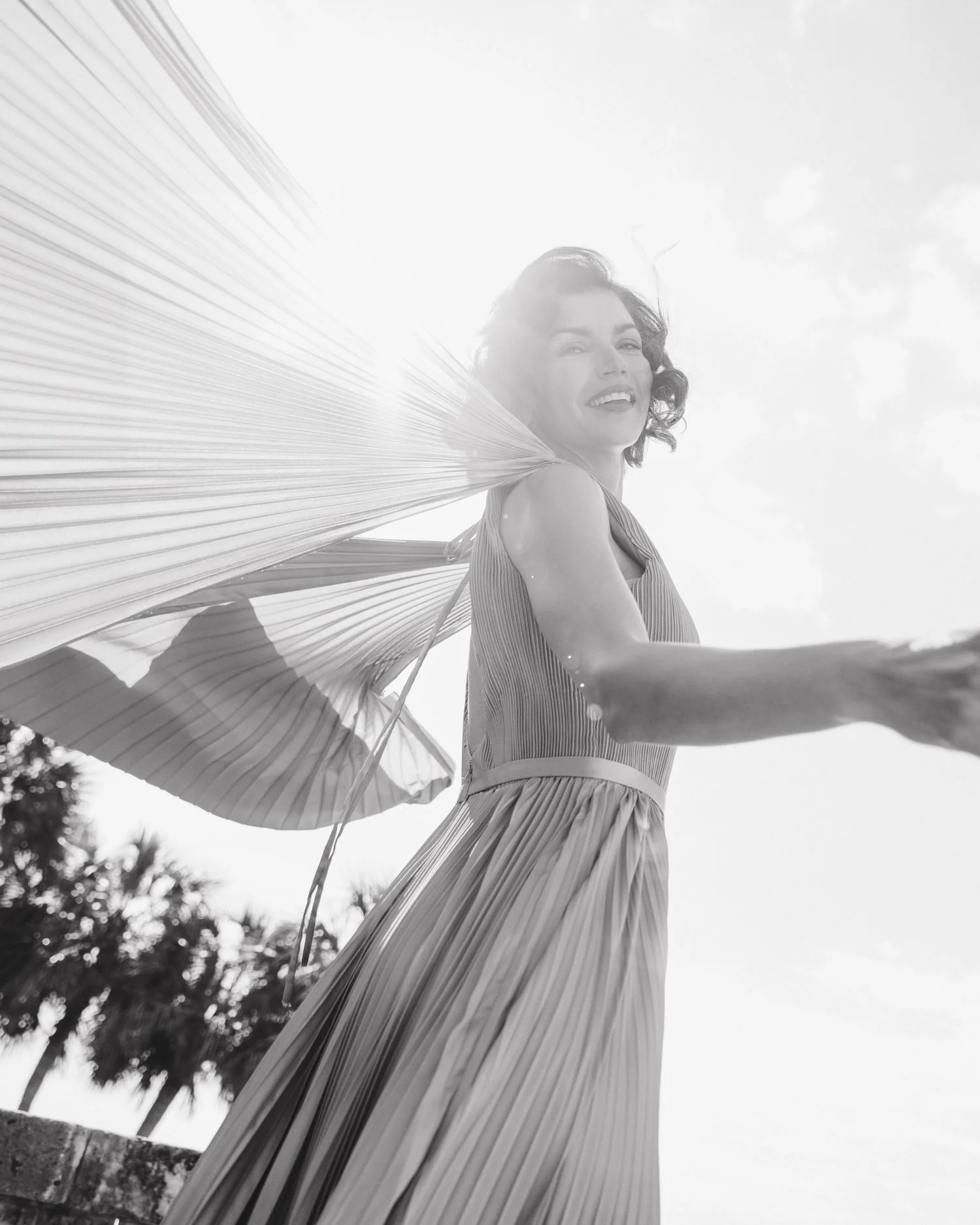 Green Sleeveless High Neck Cape Back Heat Pleated Gown