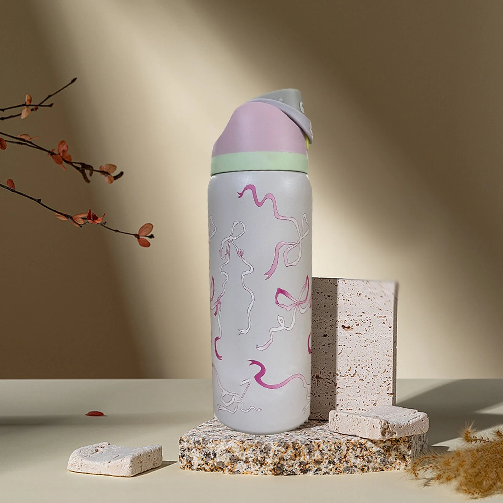 Owala Special Edition 32oz Stainless Steel FreeSip Water Bottle with Pink Ties and Bows