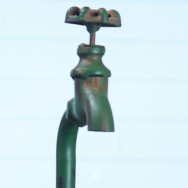 Rustic Style Planter With Decorative Faucet