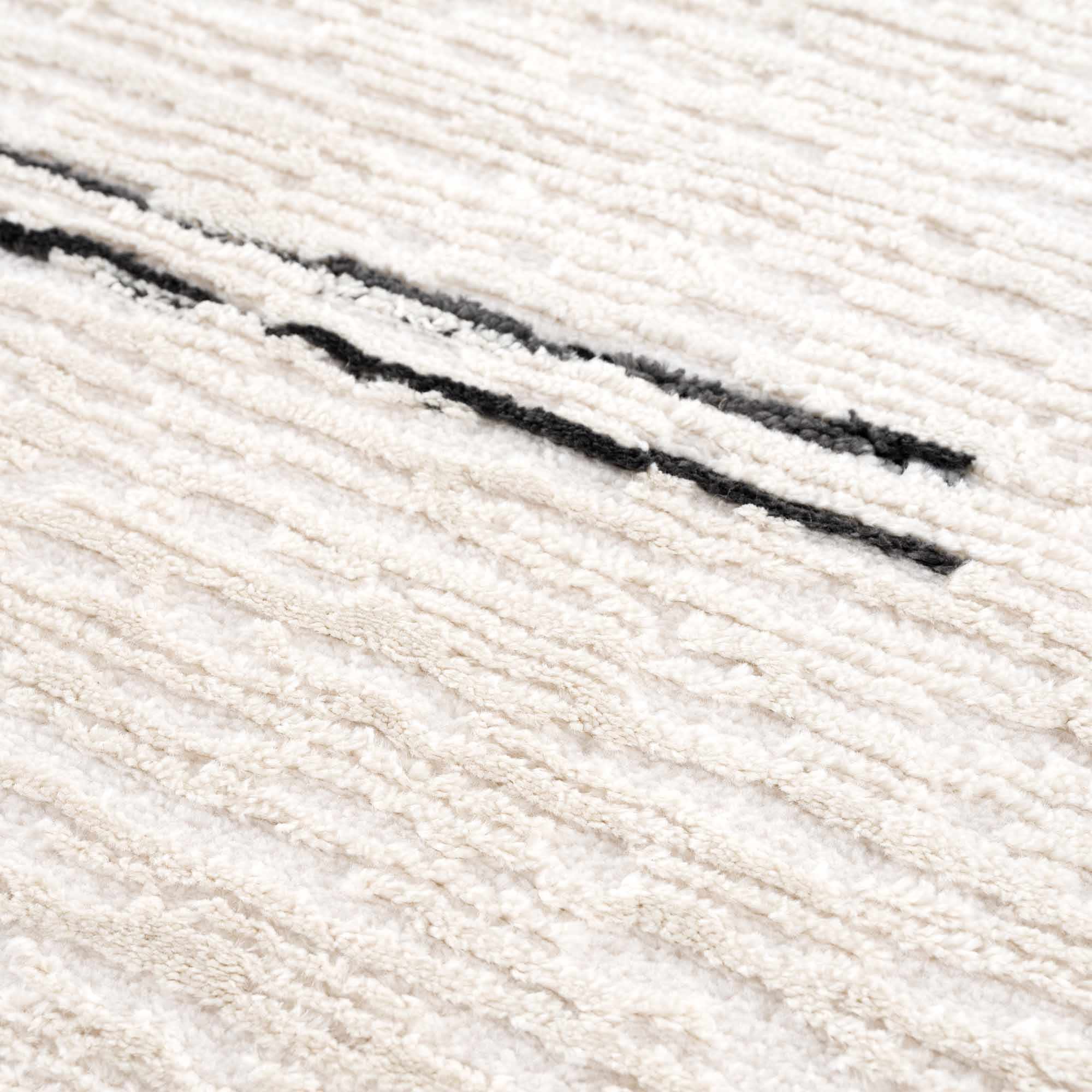 White Area Rug with Tassels