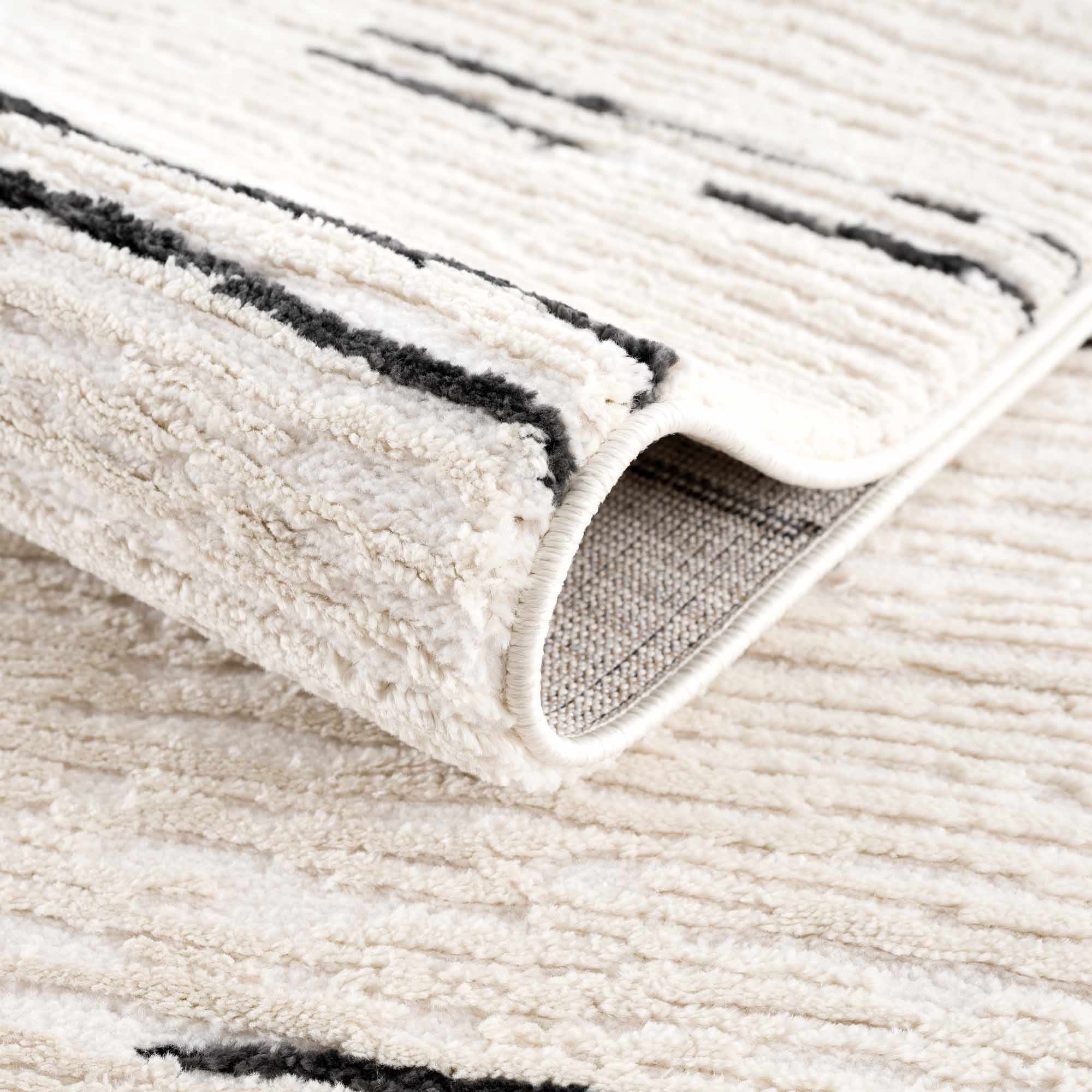 White Area Rug with Tassels