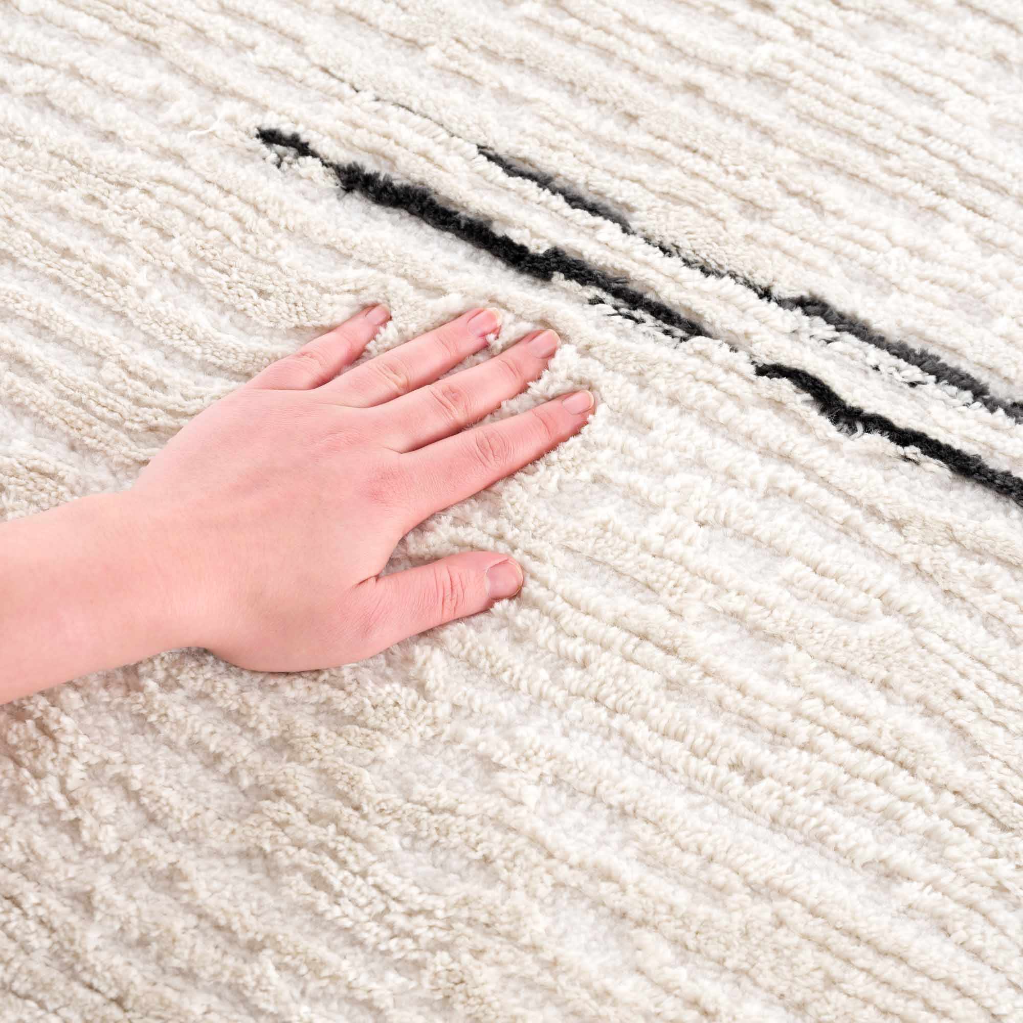 White Area Rug with Tassels