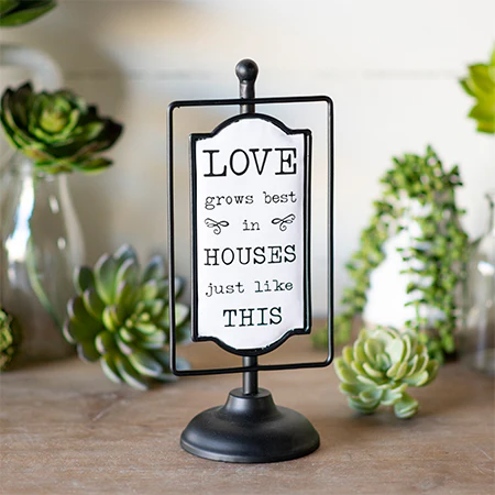 Enamel Love Grows Sign on Stand