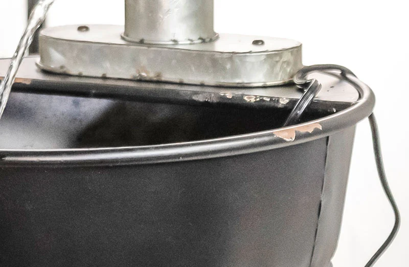 Distressed Water Pump Fountain