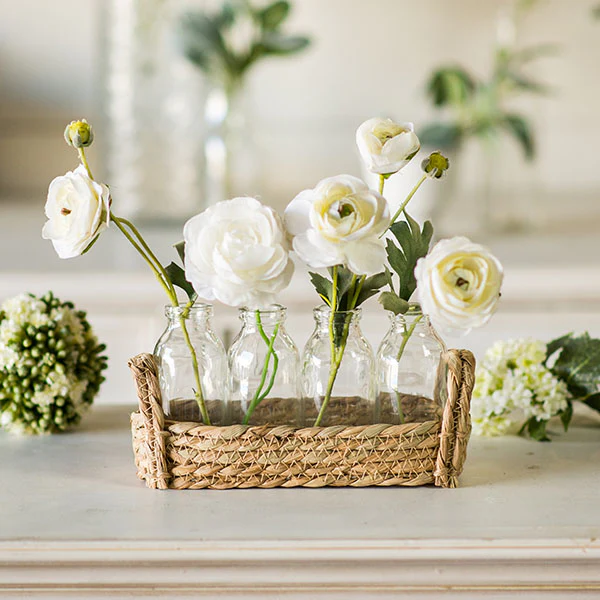 Wicker Basket with Four Milk Bottles