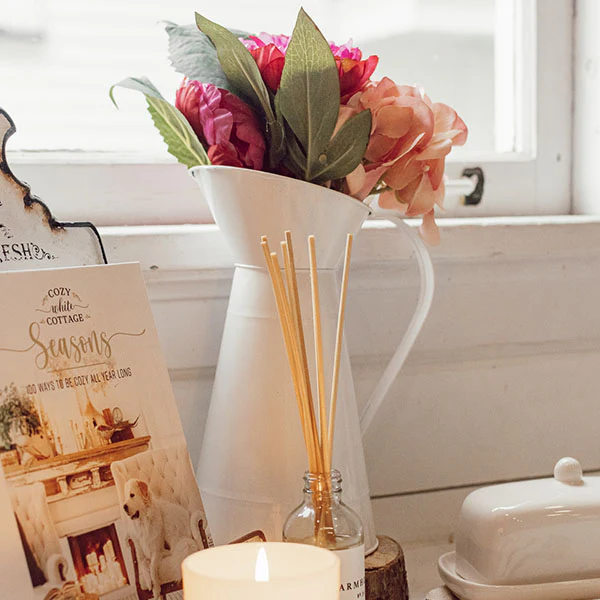 Ceramic Pitcher with Faux Flowers