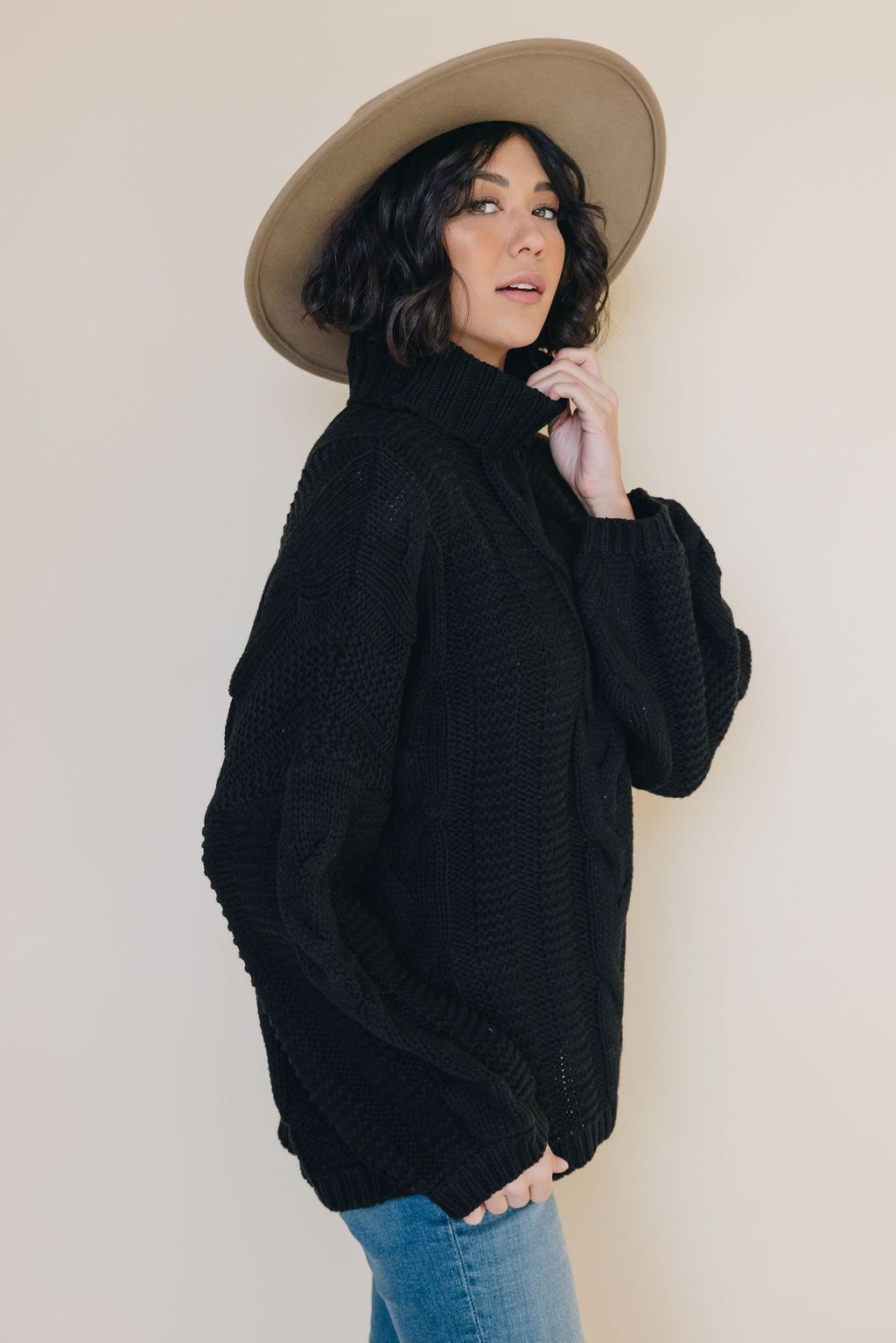 Hand In Hand Turtleneck Sweater