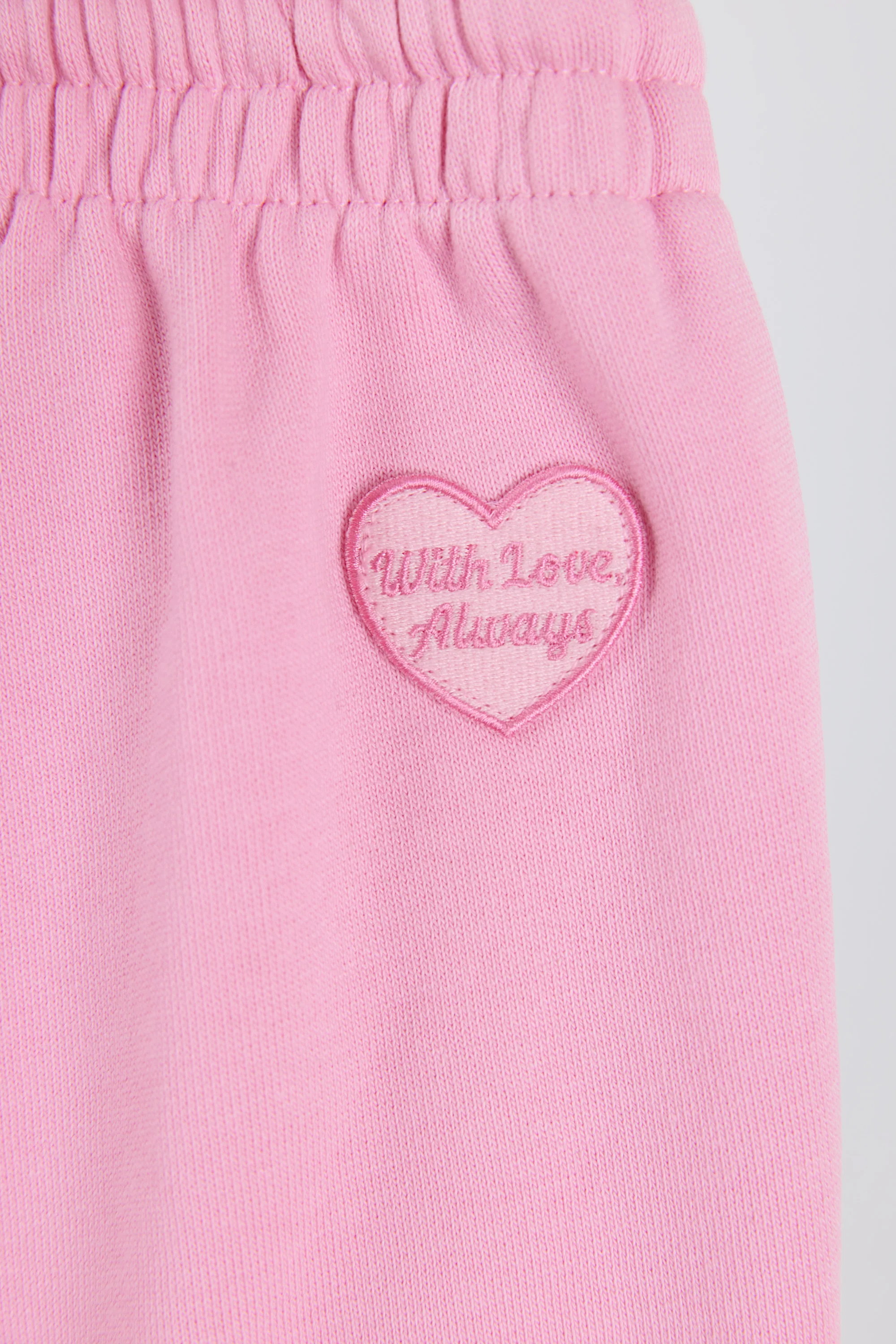 Mid-Rise Wide-Leg Joggers in Baby Pink