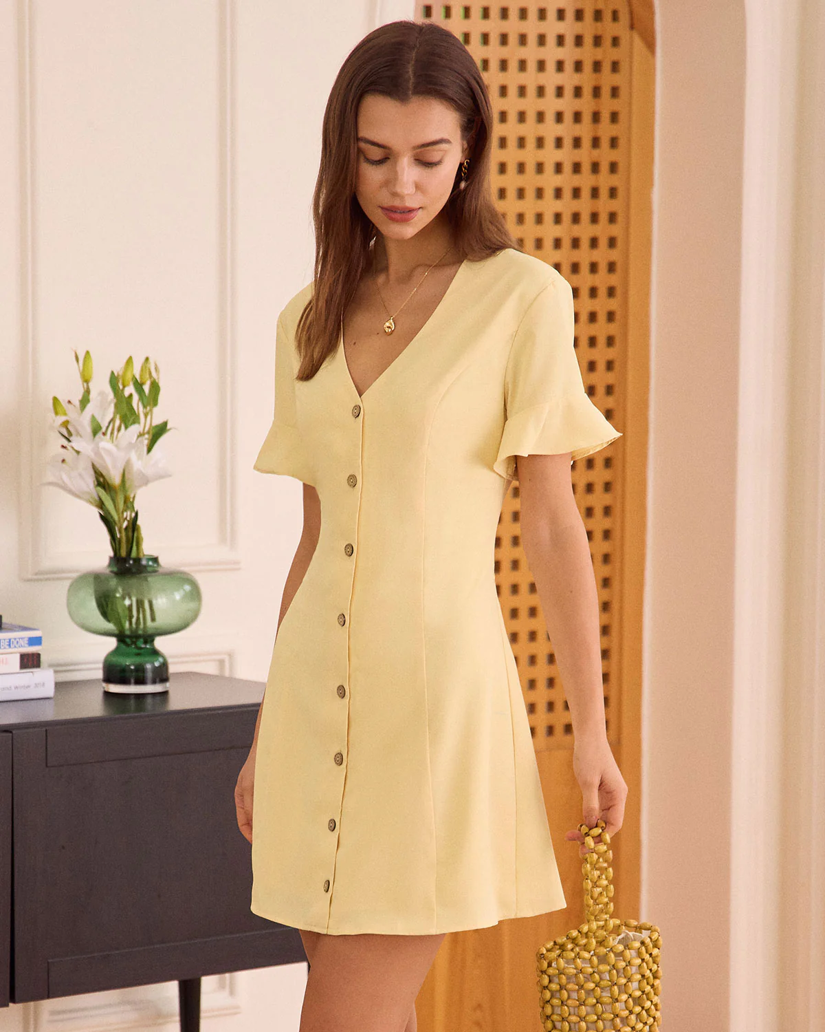 The Yellow V Neck Ruffle Button-up Mini Dress