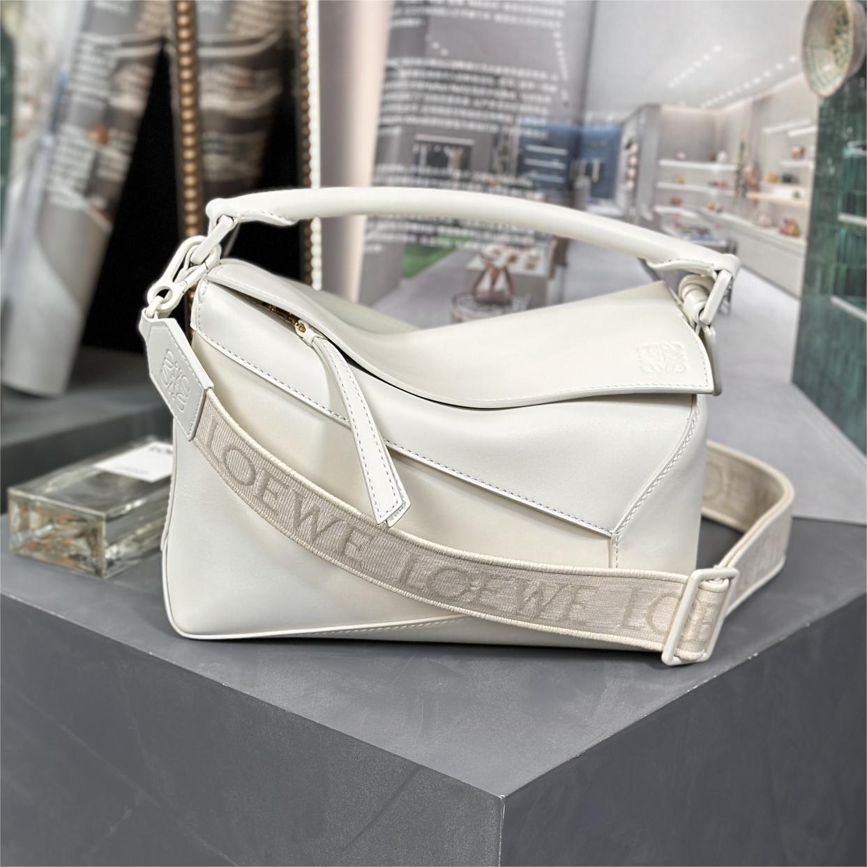 Loewe-Puzzle-24cm