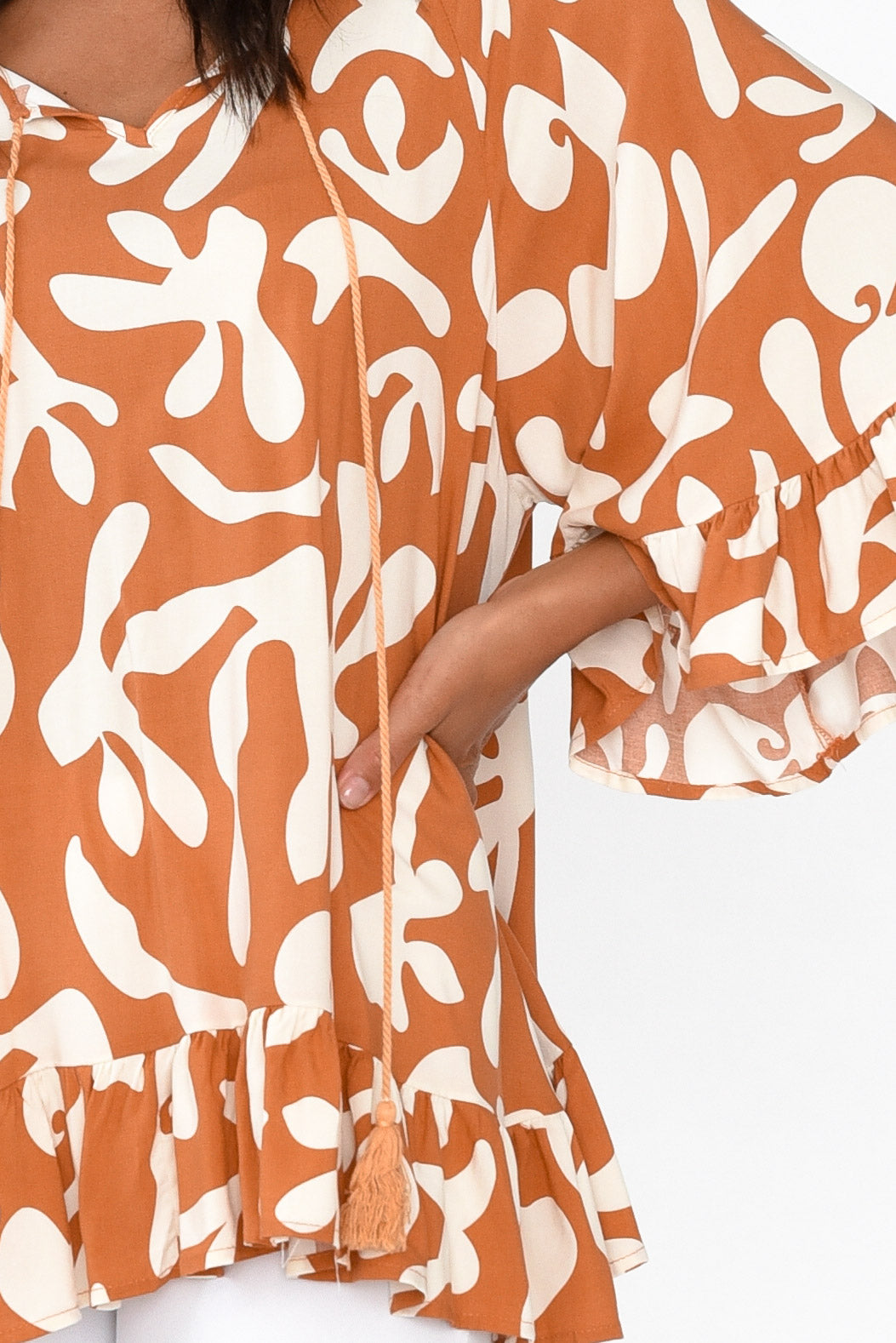Chase Rust Abstract Tassel Ruffle Top