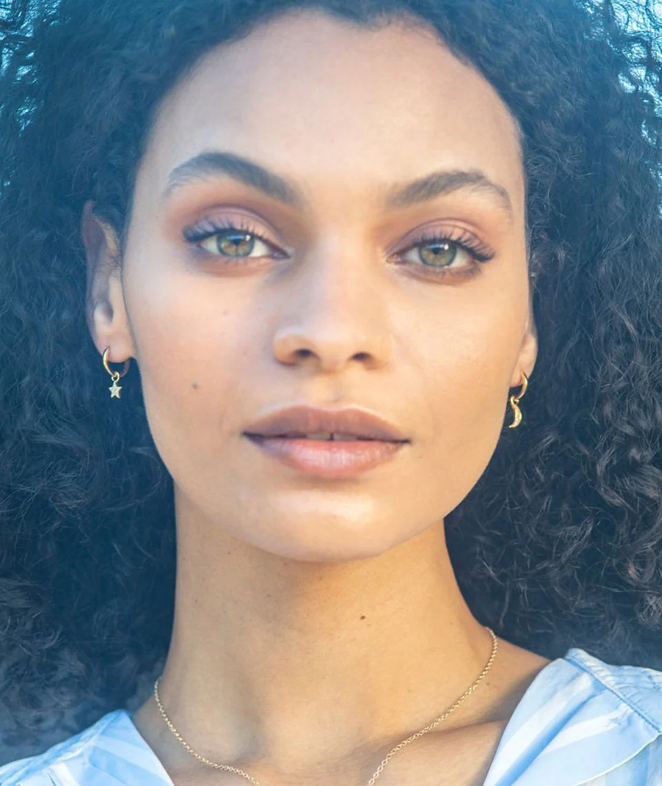 Kris Nations Star + Moon Huggie Hoop Earrings in Gold/Crystal Quartz