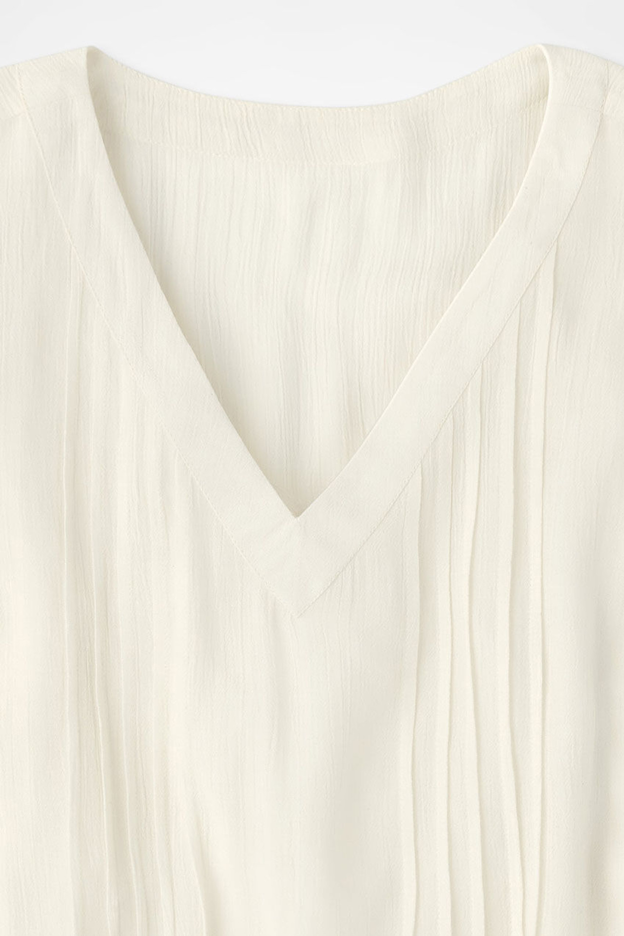 Solstice Tuck-and-Release Cap-Sleeve Blouse