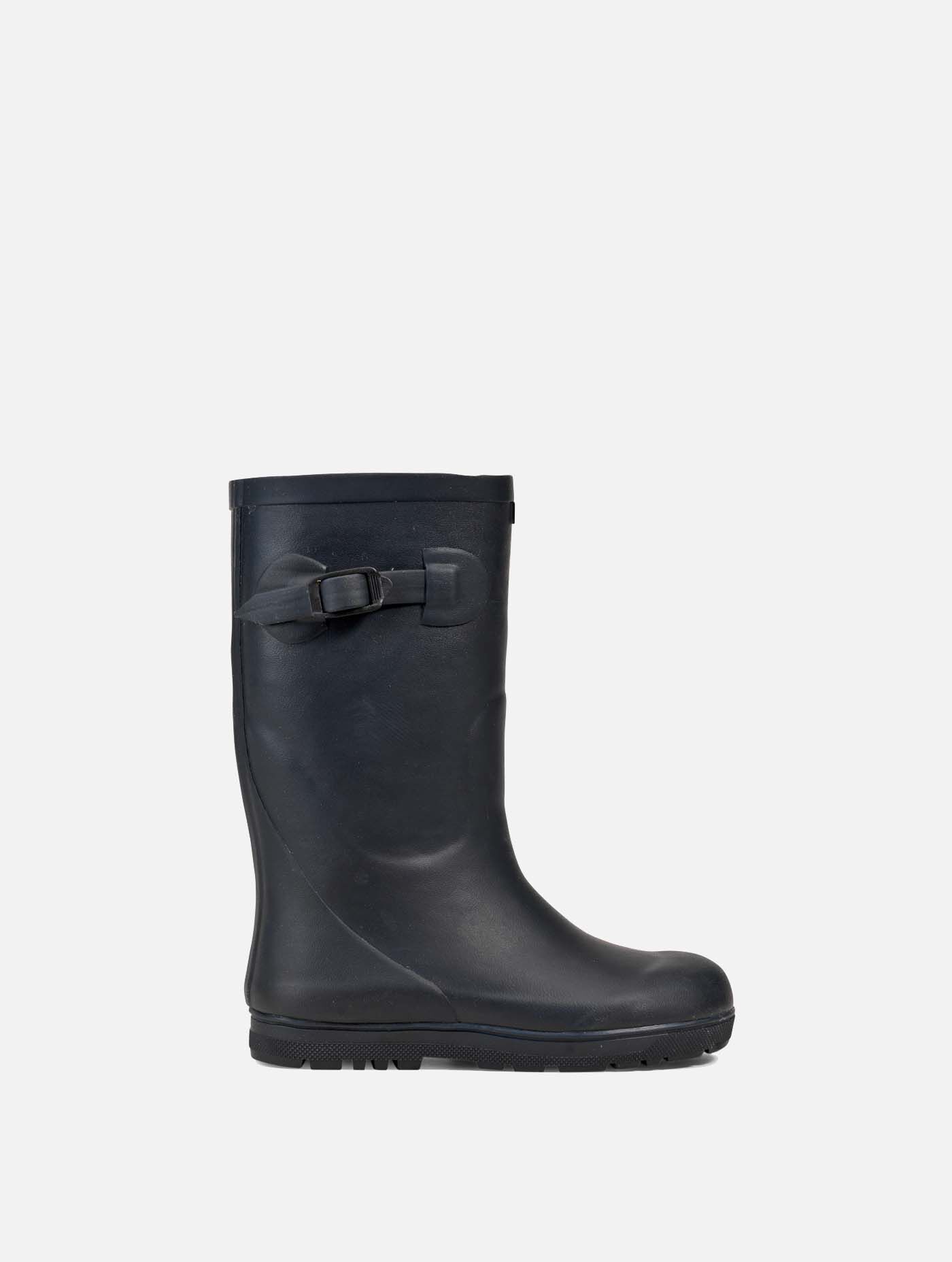 Fur-lined children's boot with a fun lugged sole.