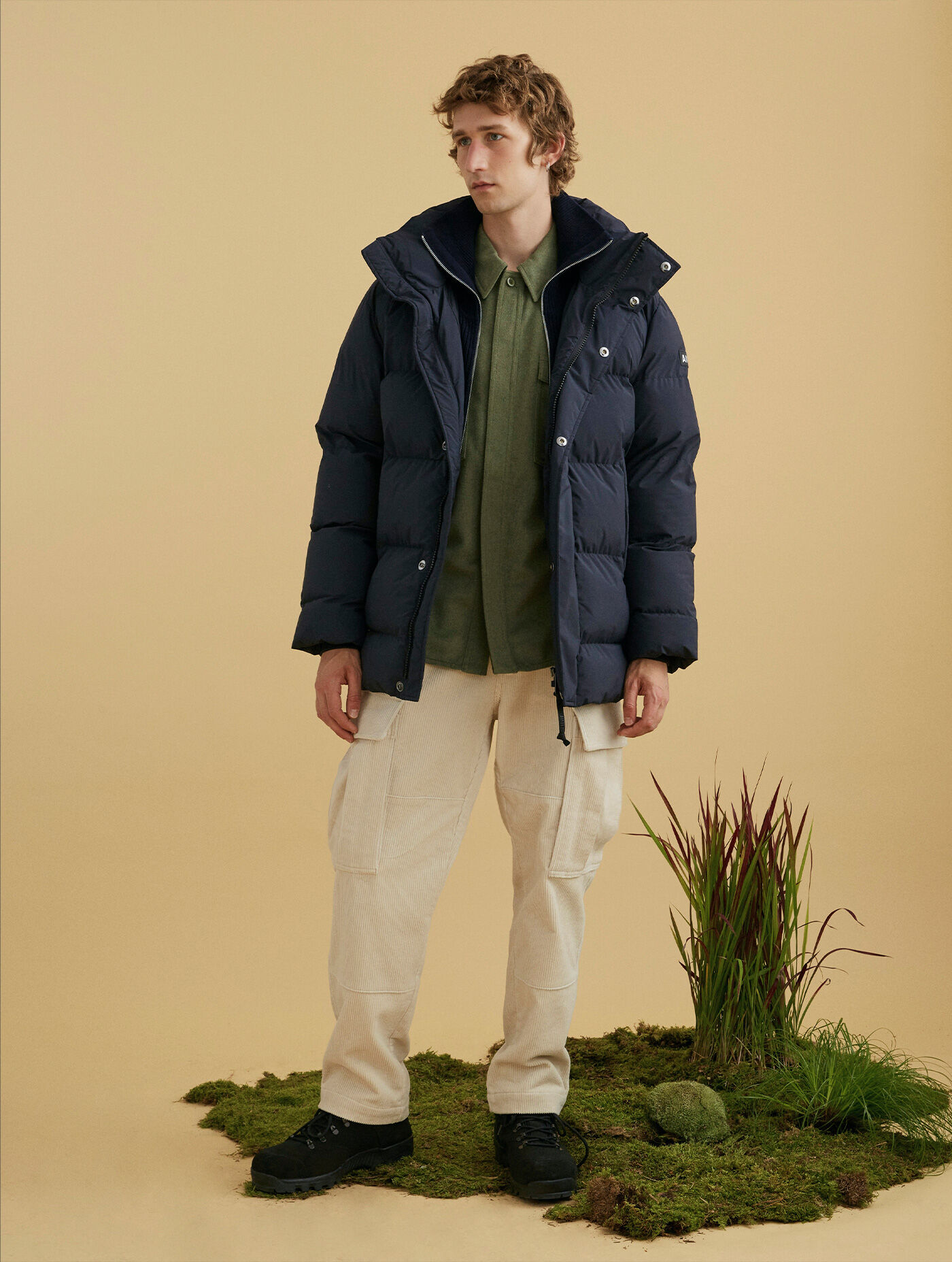 Mid-length hooded padded Dupont Sorona&reg; quilted waterproof jacket