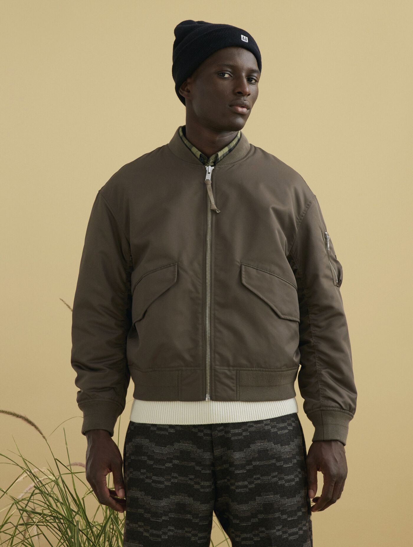 Short hooded padded Dupont Sorona&reg; quilted water-repellent bomber jacket