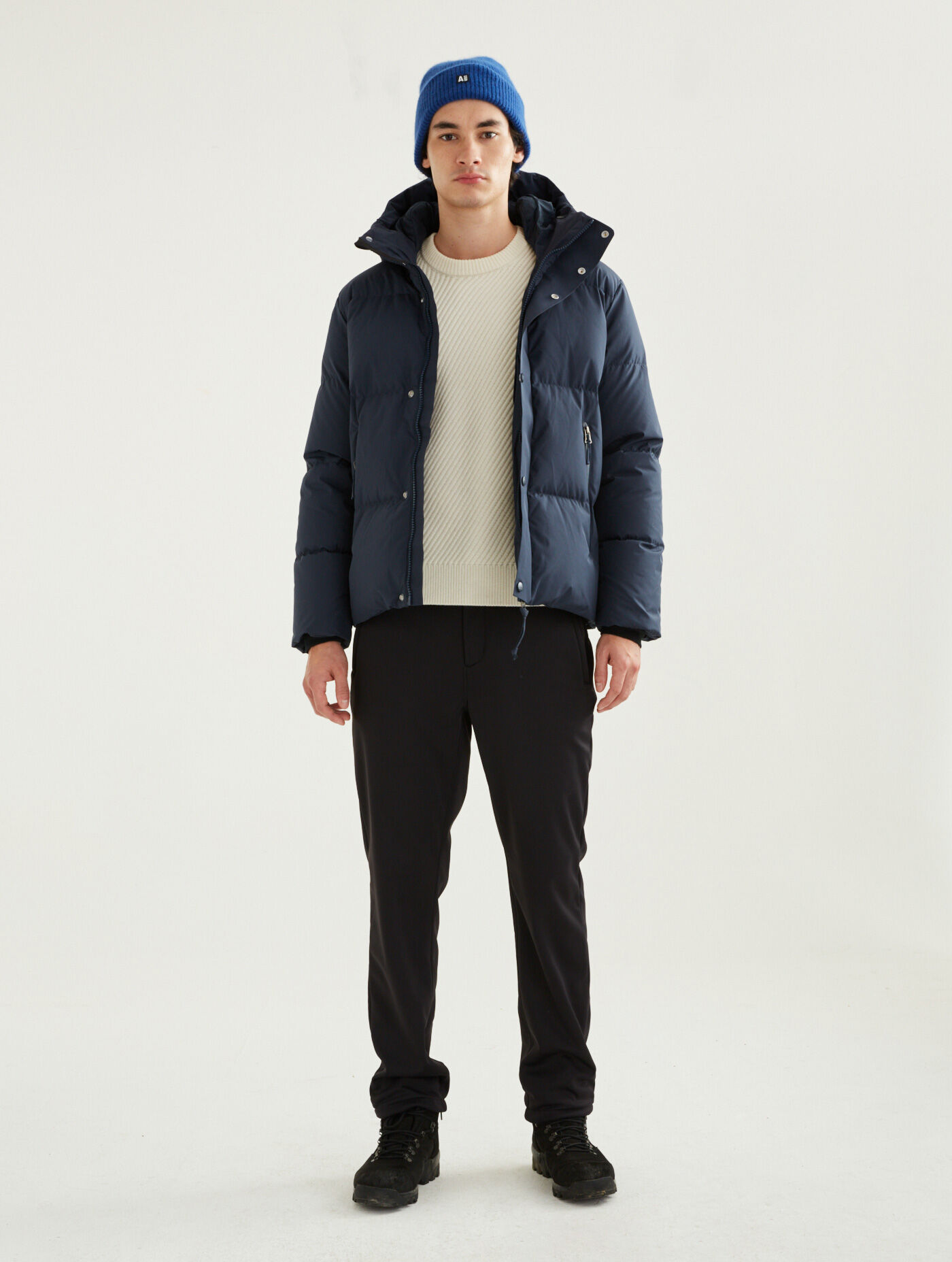 Mid-length hooded down quilted Gore-Tex&reg; Infinium Windstopper jacket