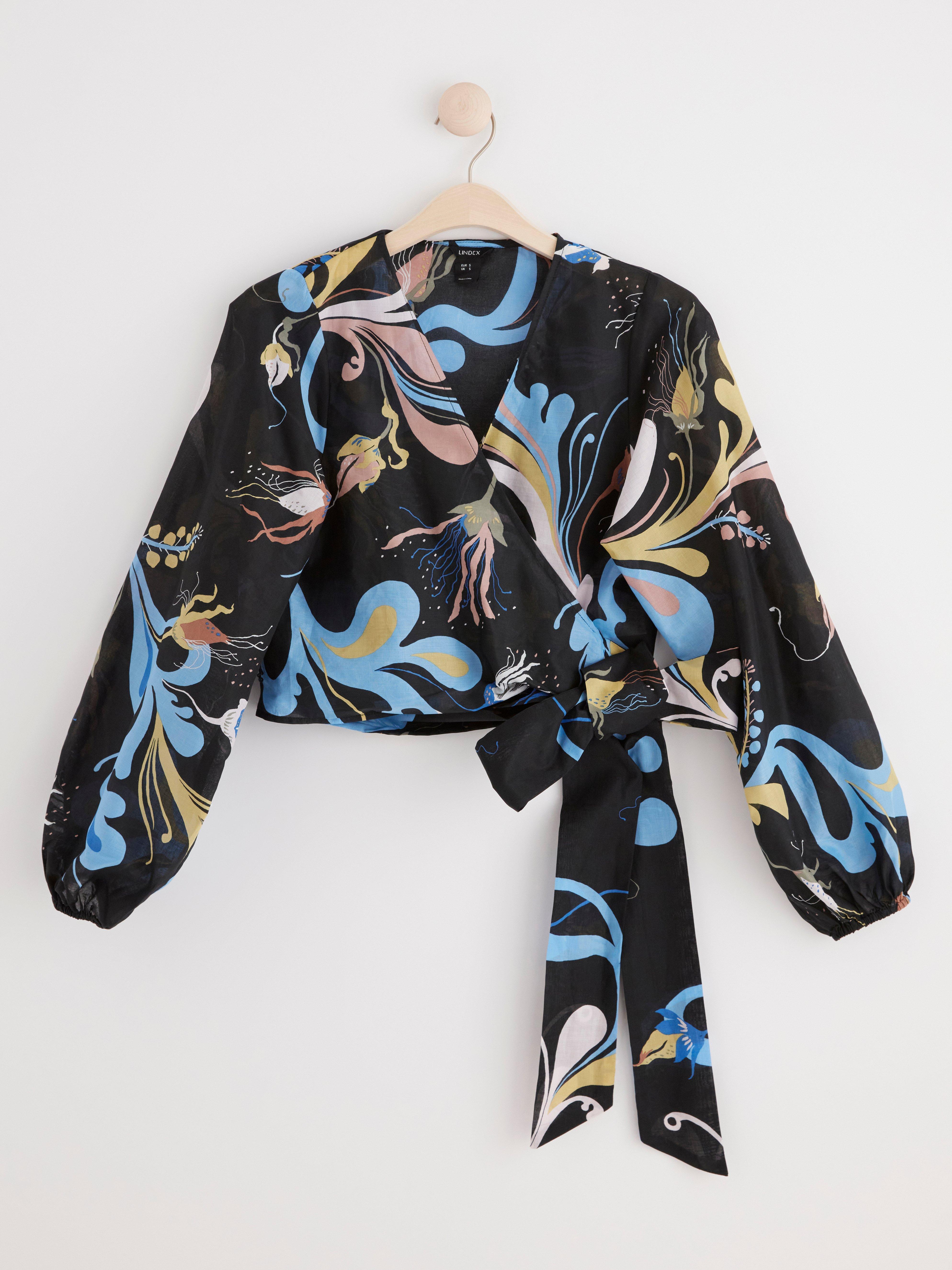 Patterned puff sleeve wrap blouse Black