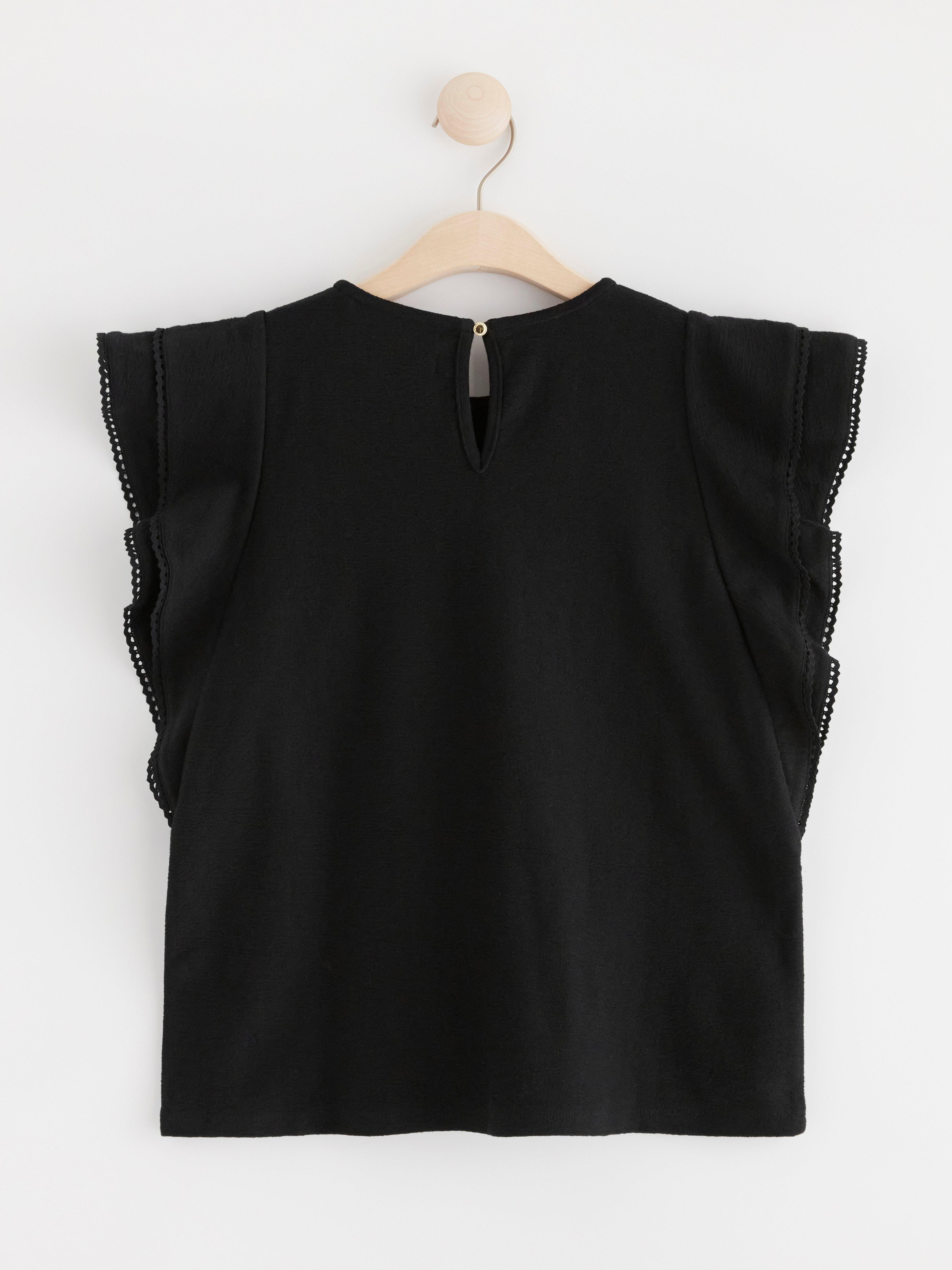 Top with flounces Black