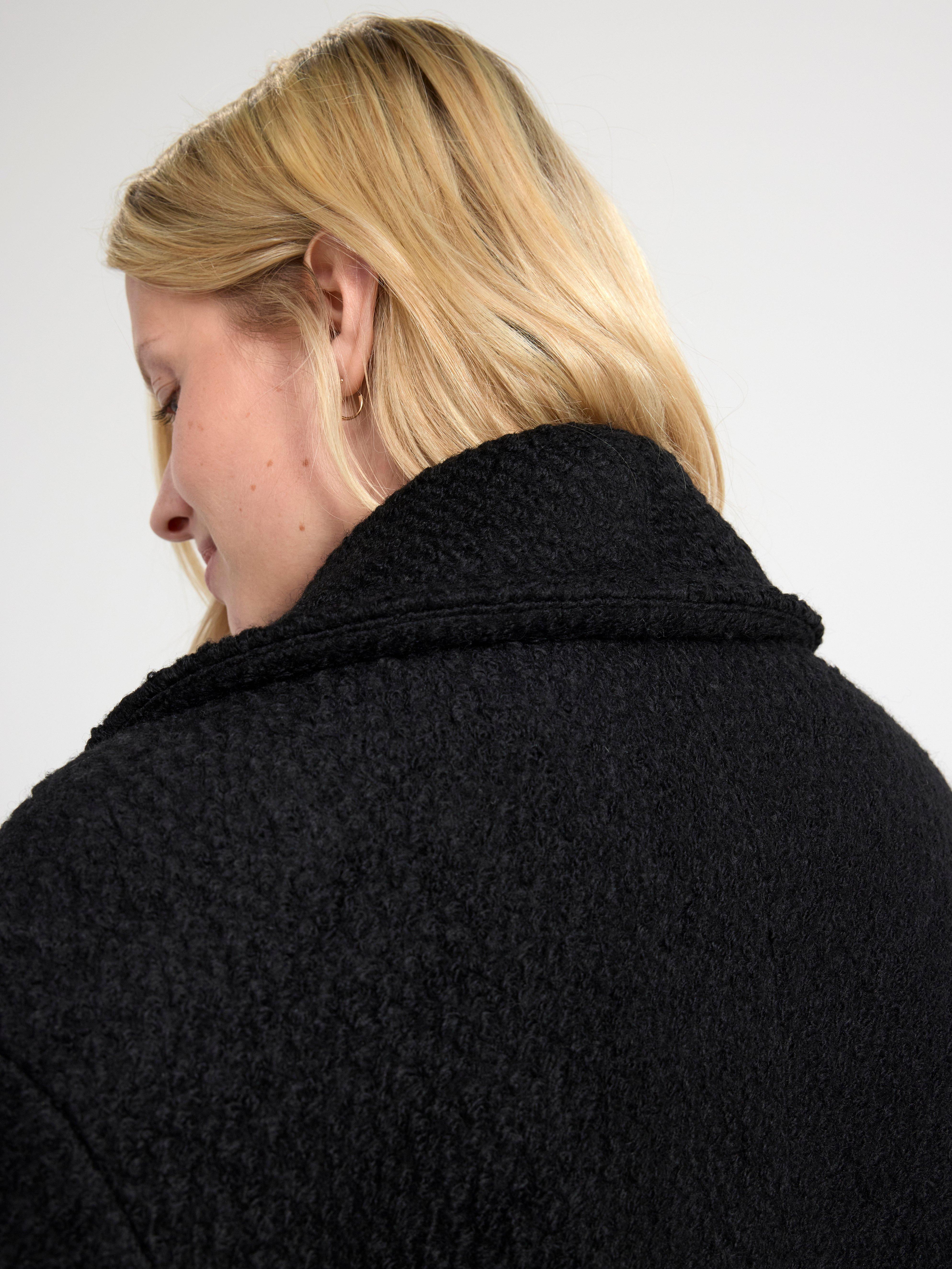 Coat in bouclé Black