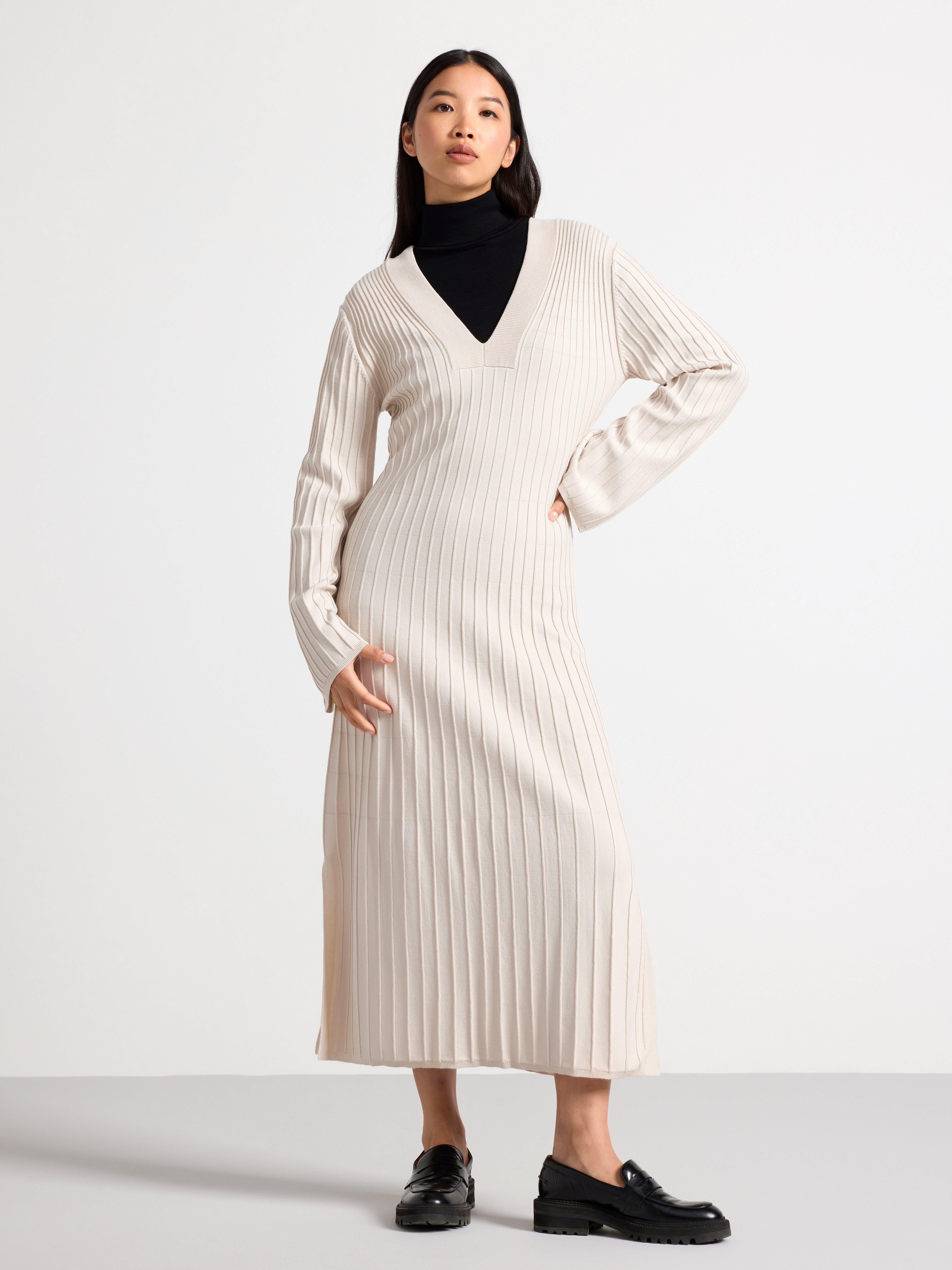 Roll neck top in merino wool Black