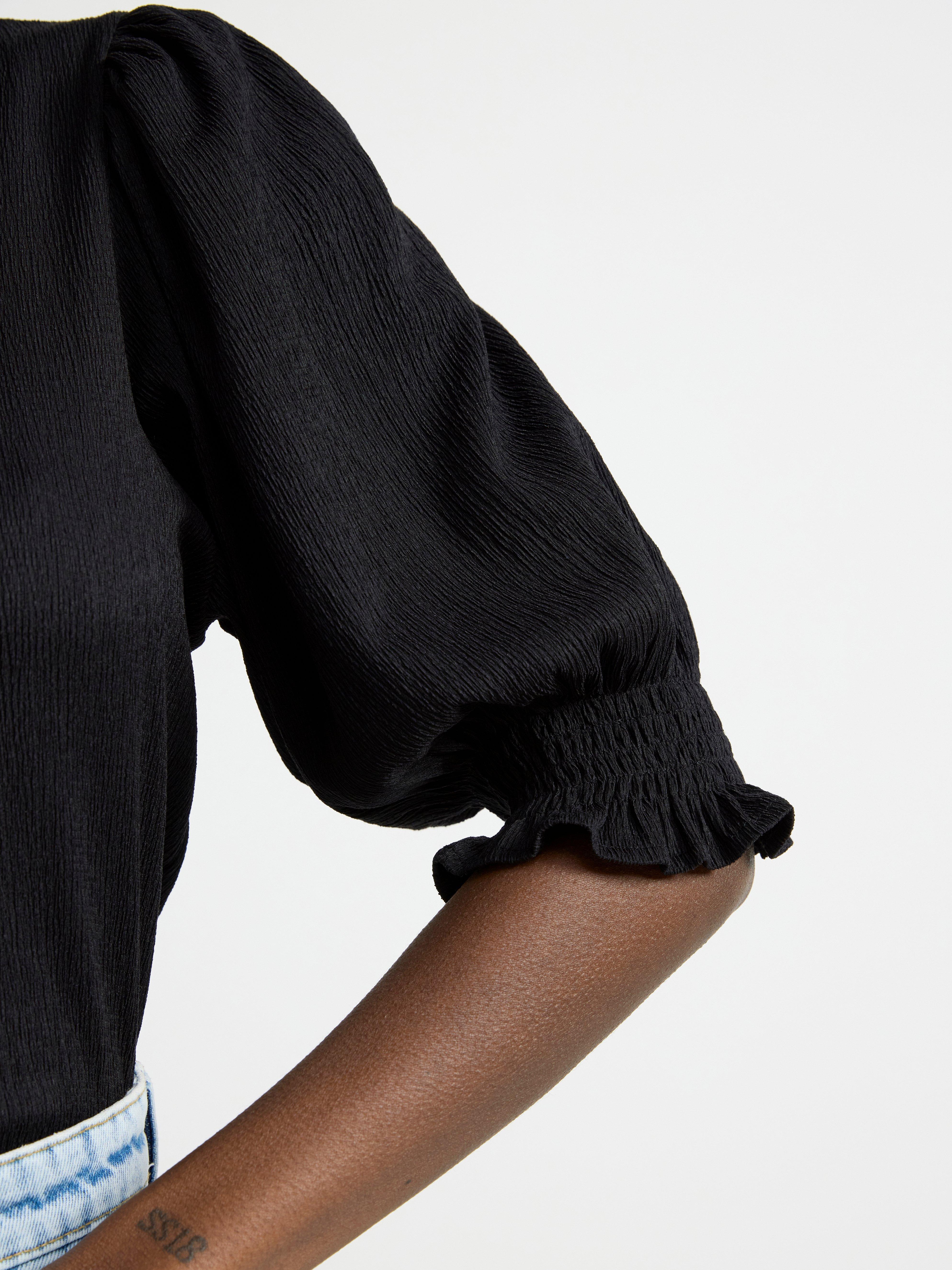 Textured puff sleeve top Black