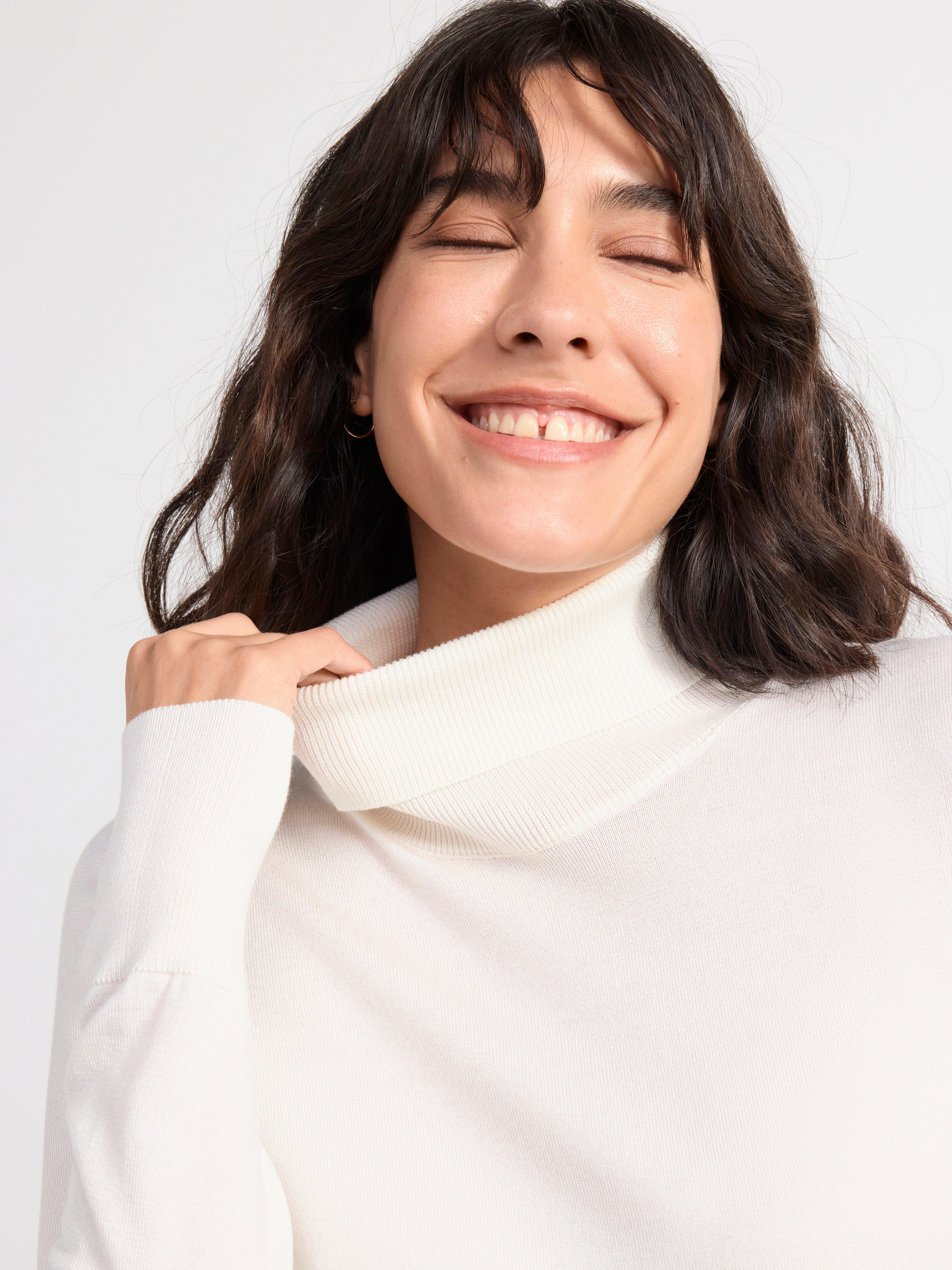 Fine-knit roll neck top Off White