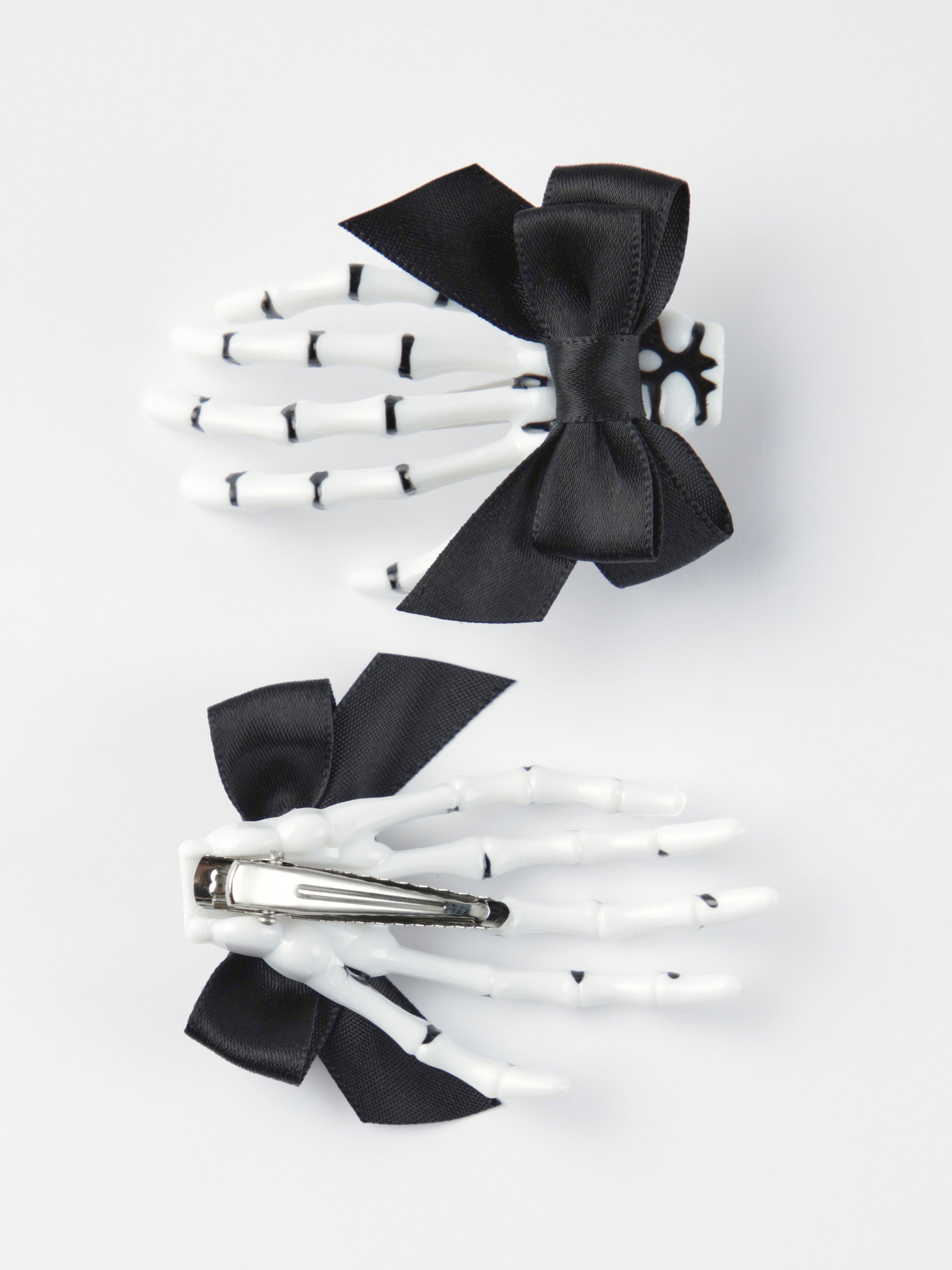2-pack skeleton hand hair clips Black