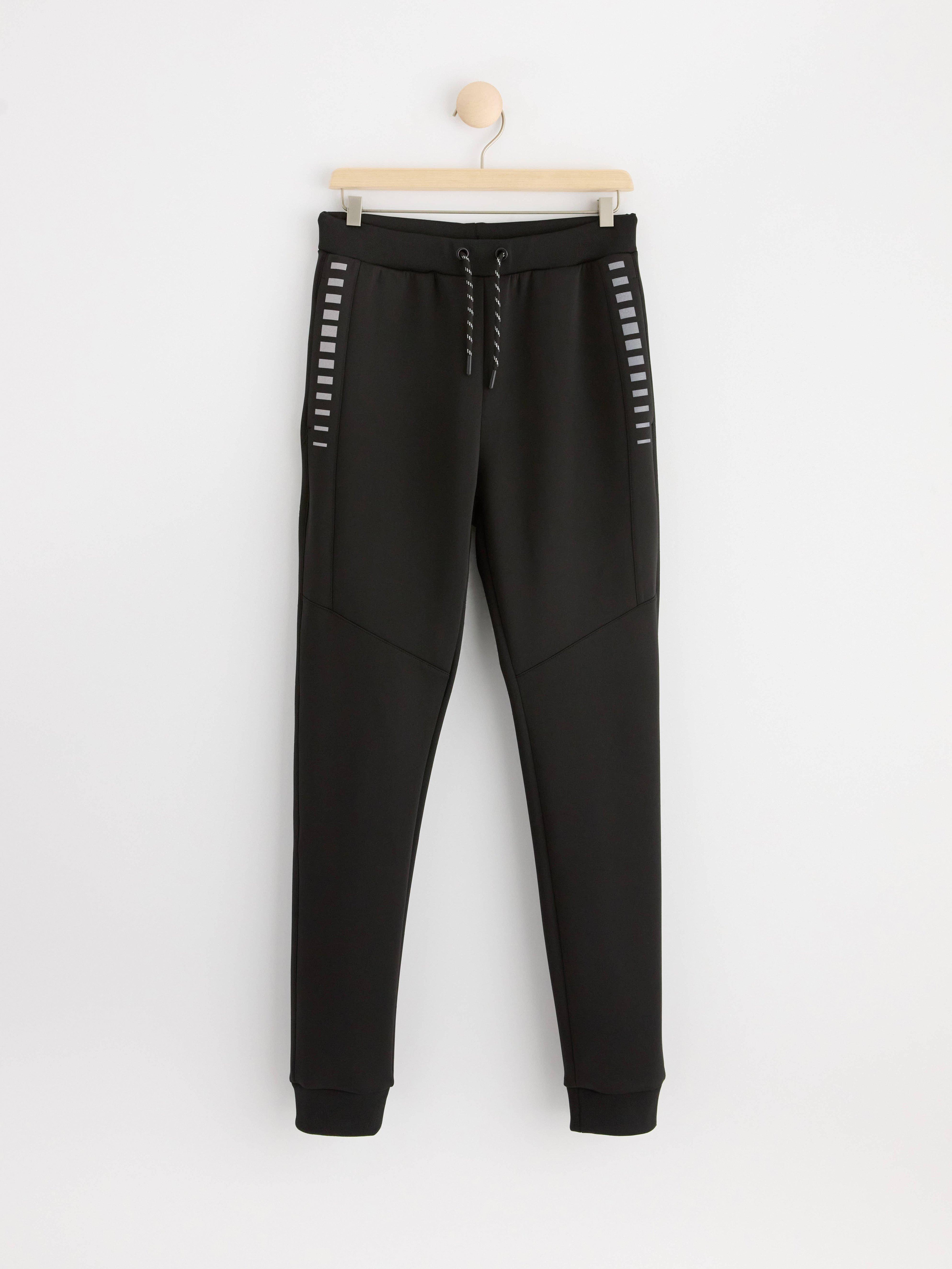 Sweatpants with reflective stripes Black