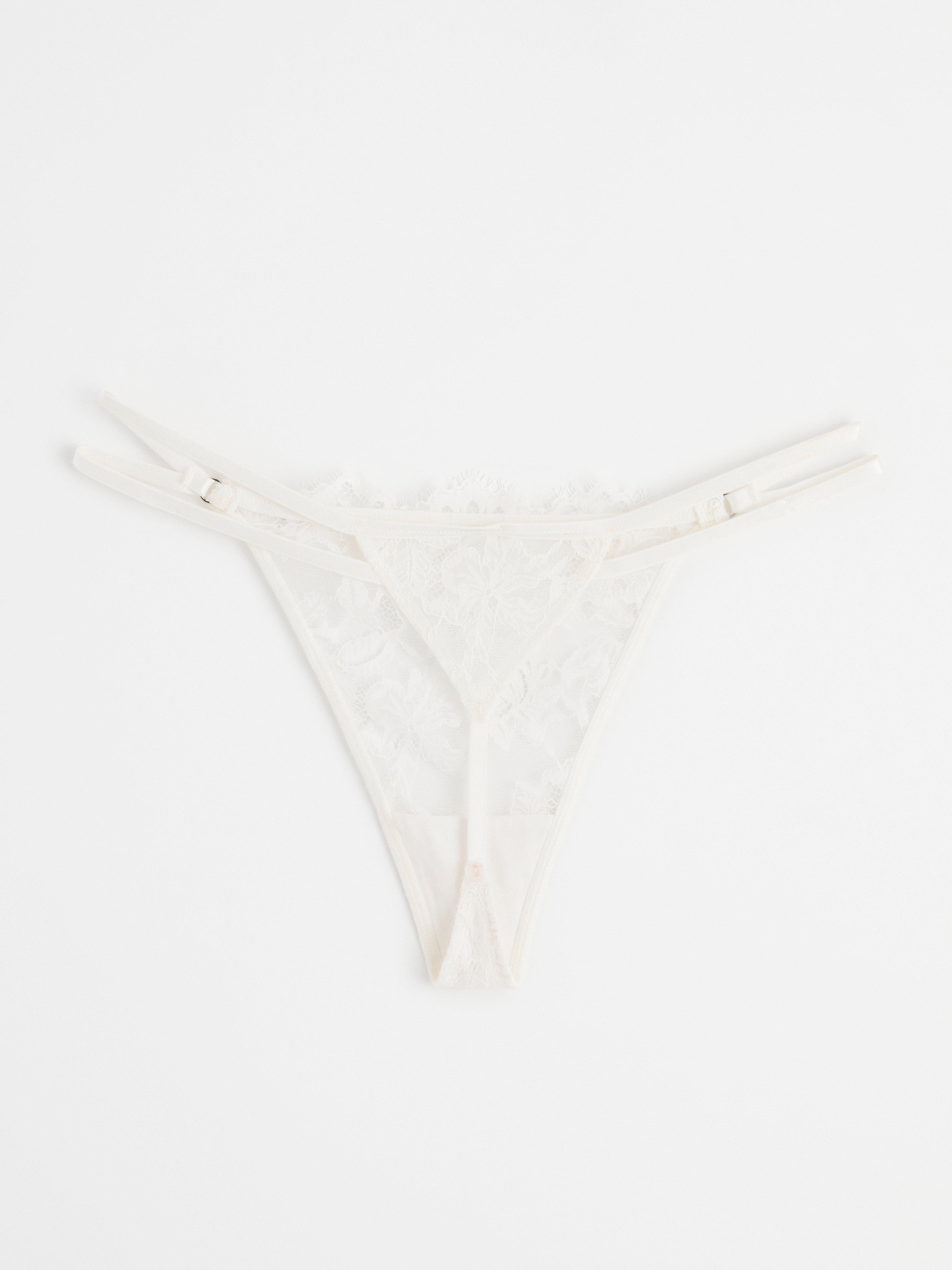 Thong low waist with lace Light White
